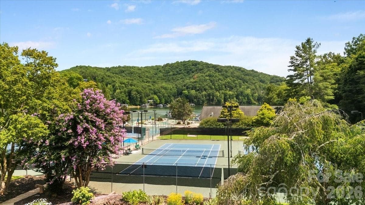 This property features extensive amenities at Rumbling Bald, offering a premier lifestyle experience. - 179 Rock Spring Road, Lake Lure