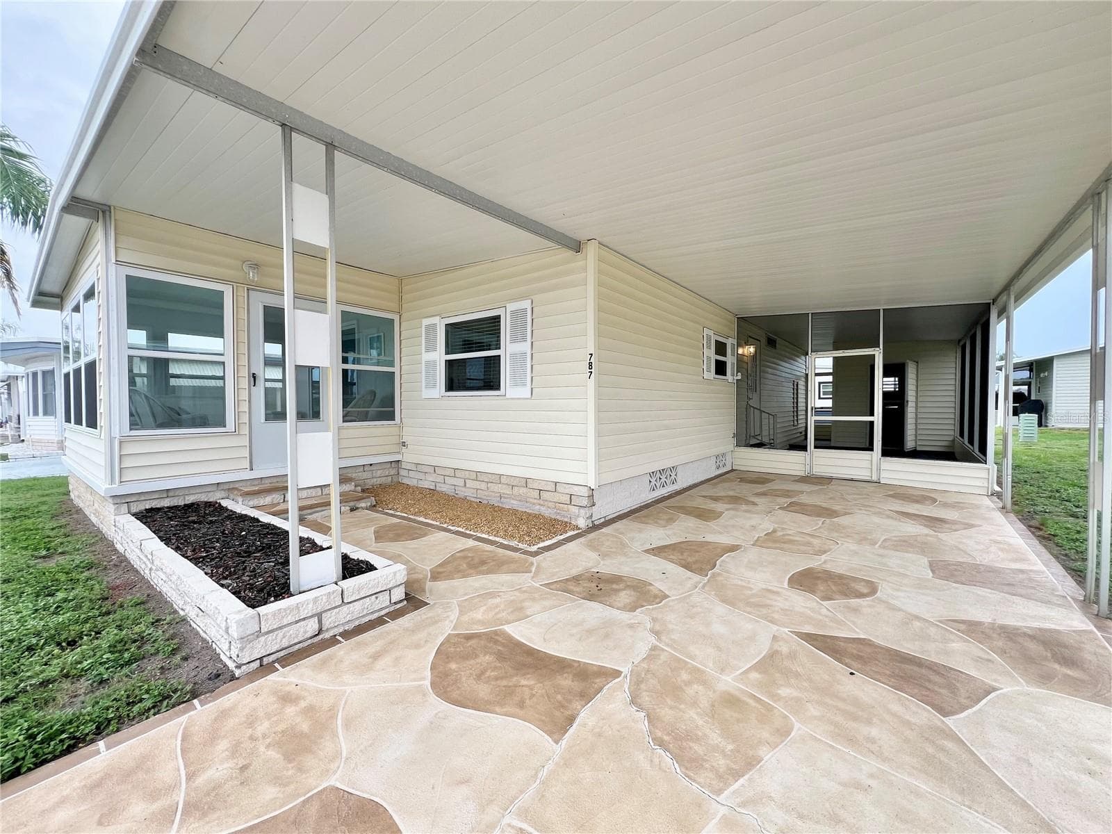 Carport decorative driveway - 1100 BELCHER RD S #787, LARGO