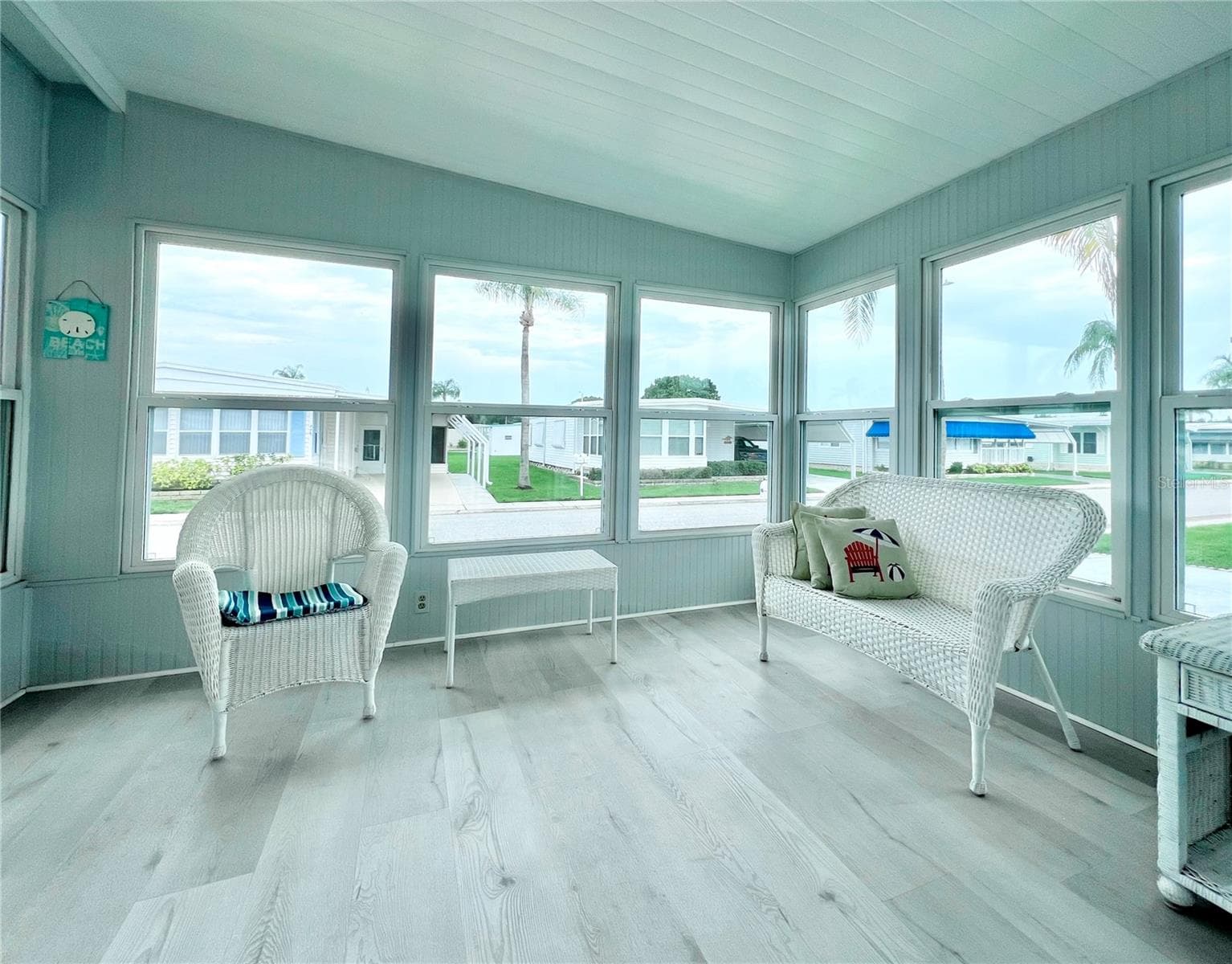 Front Florida room with new windows and doors - 1100 BELCHER RD S #787, LARGO