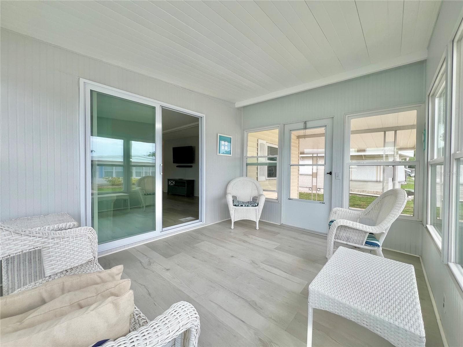 Front Florida room with new windows and doors - 1100 BELCHER RD S #787, LARGO