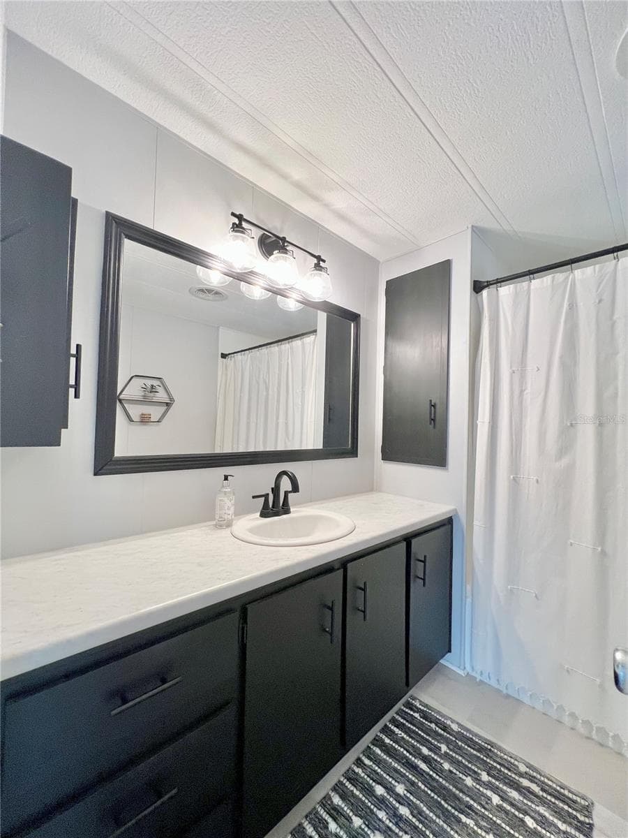 Hallway Bathroom - 1100 BELCHER RD S #787, LARGO