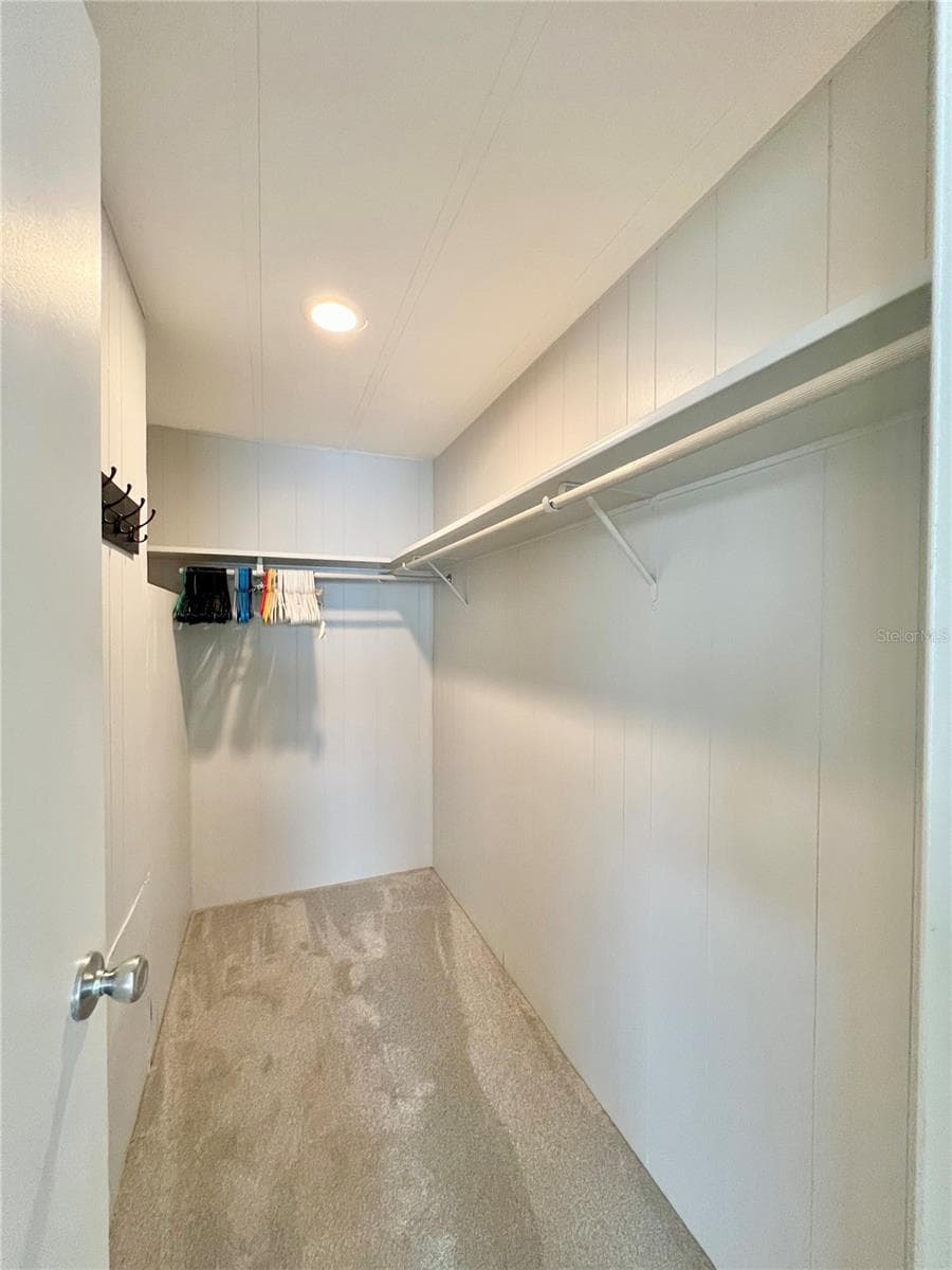 Primary walk in closet - 1100 BELCHER RD S #787, LARGO