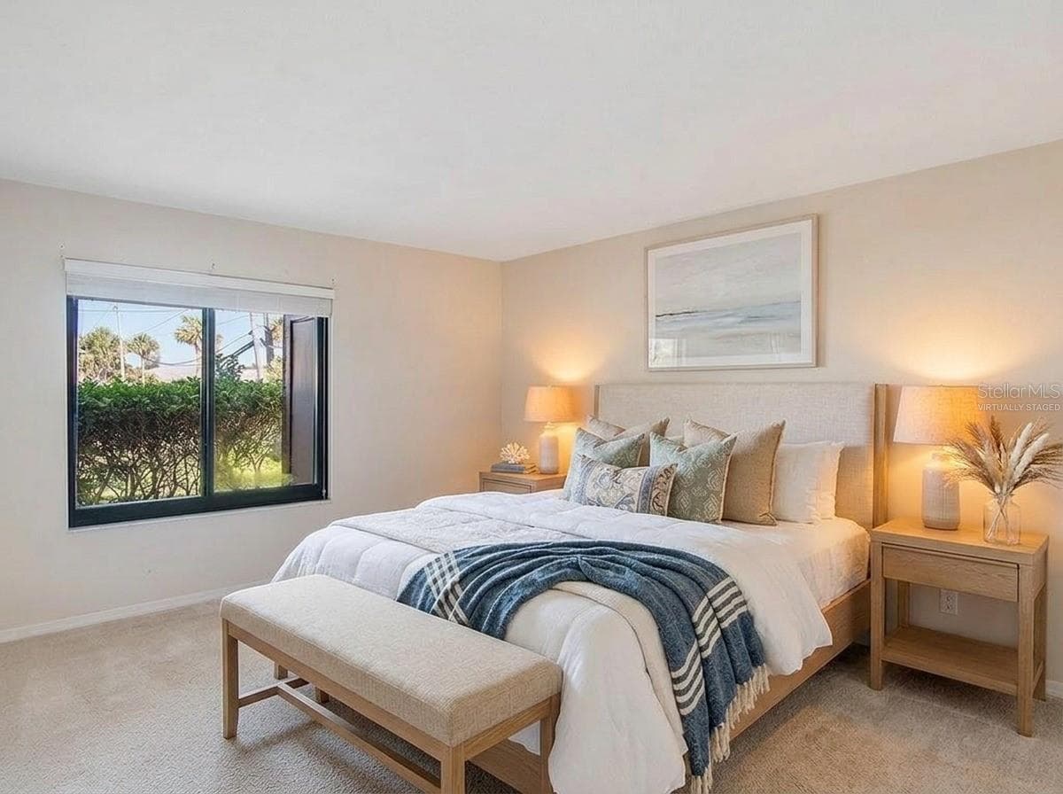 West facing bedroom virtually staged - 2600 OCEAN SHORE BLVD #111, ORMOND BEACH