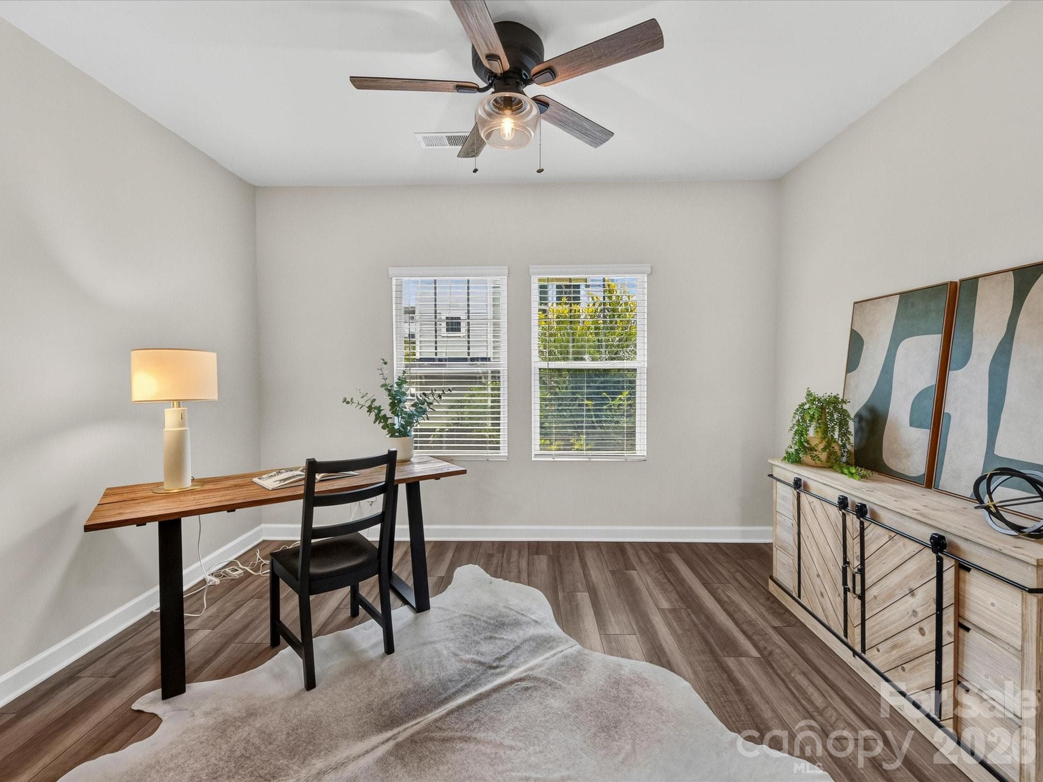 Dedicated flex space offers endless possibilities as a home office, study, playroom, or creative workspace. - 4552 Millennium Avenue, Charlotte