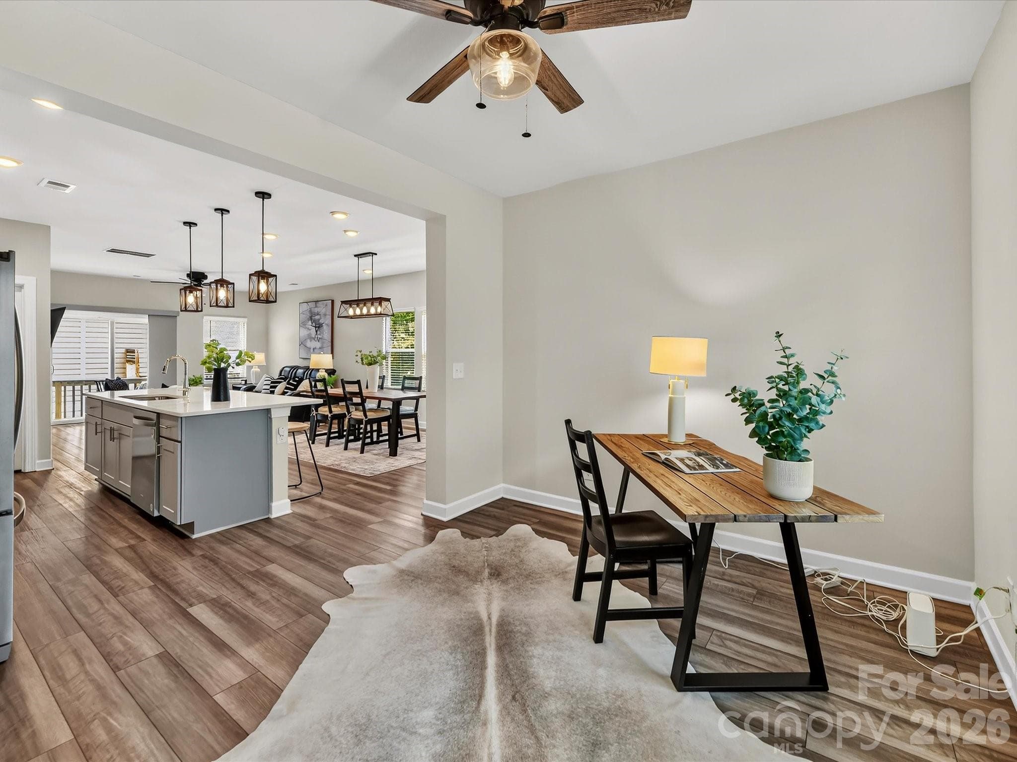 Dedicated flex space offers endless possibilities as a home office, study, playroom, or creative workspace. - 4552 Millennium Avenue, Charlotte