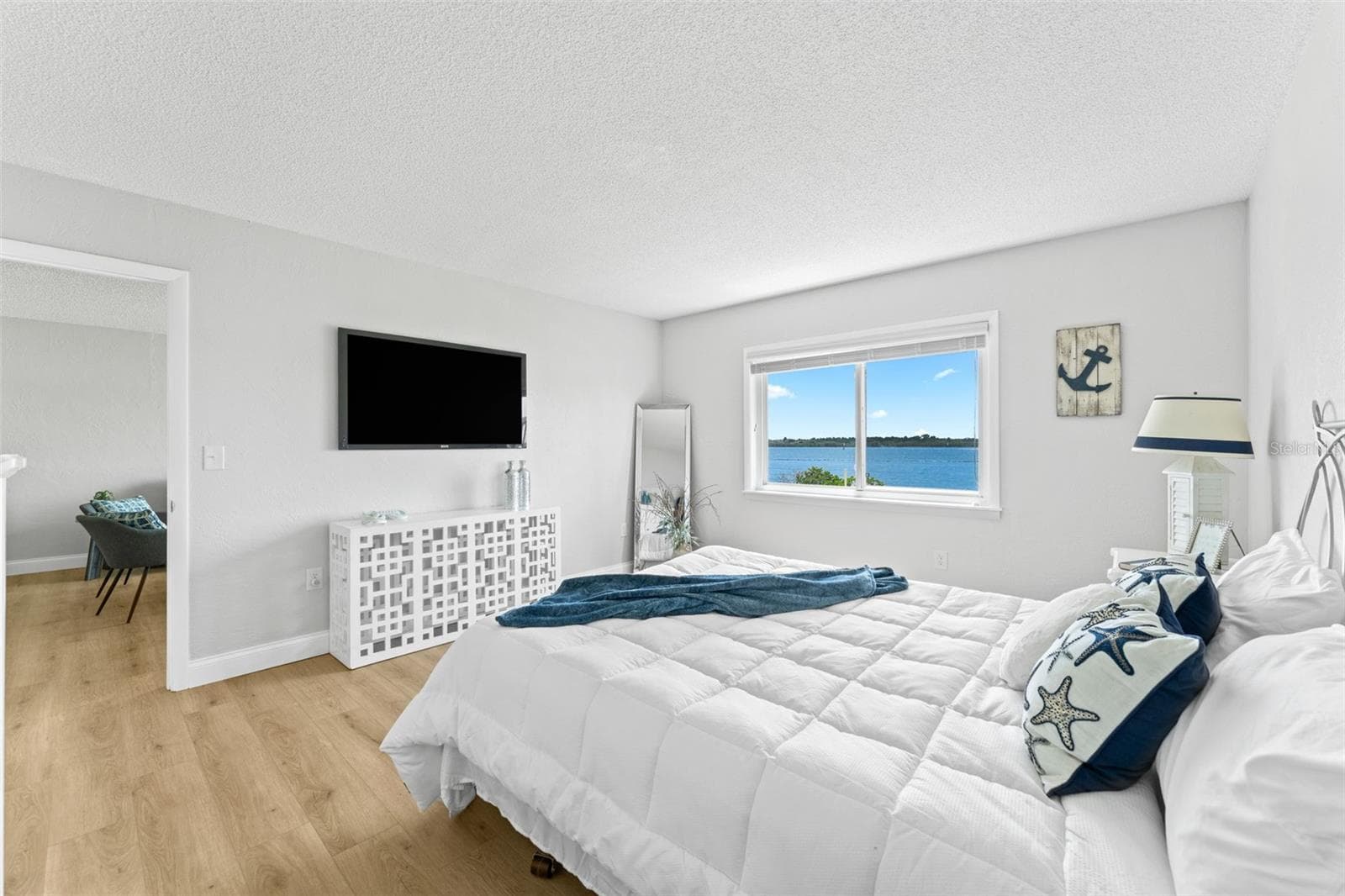 Primary bedroom... what a view. - 3606 S PENINSULA DR #102, PORT ORANGE