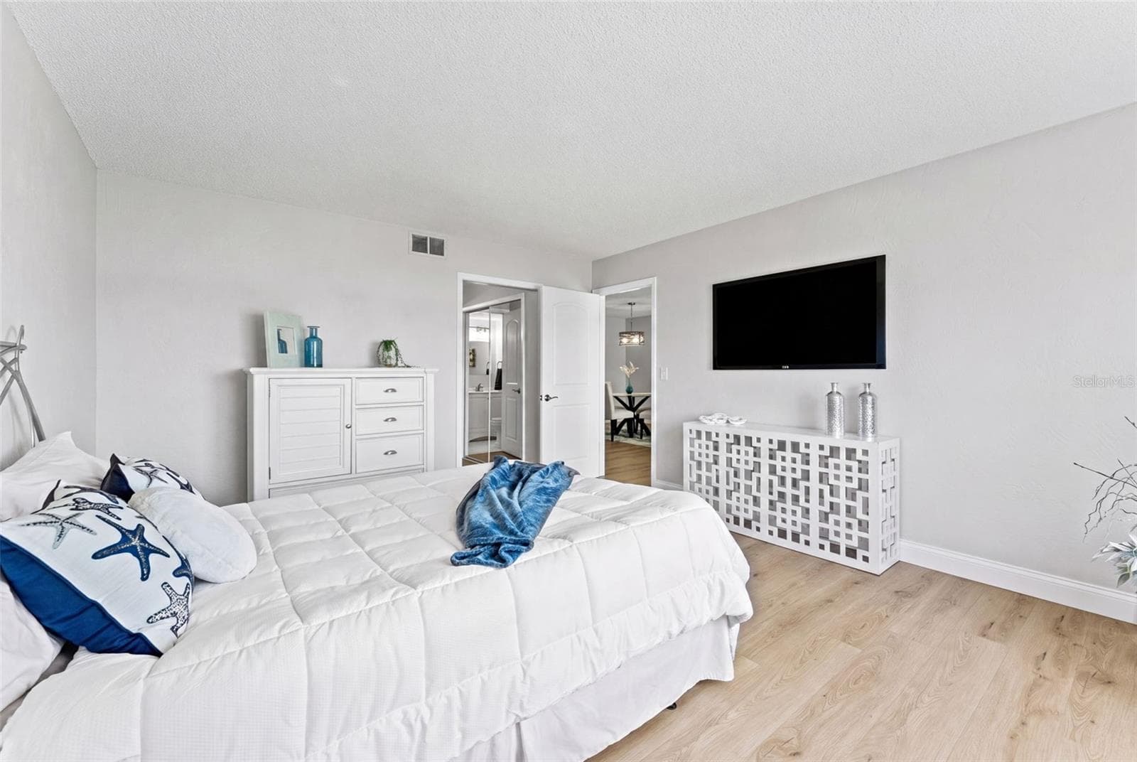 View to the ensuite bathroom. - 3606 S PENINSULA DR #102, PORT ORANGE