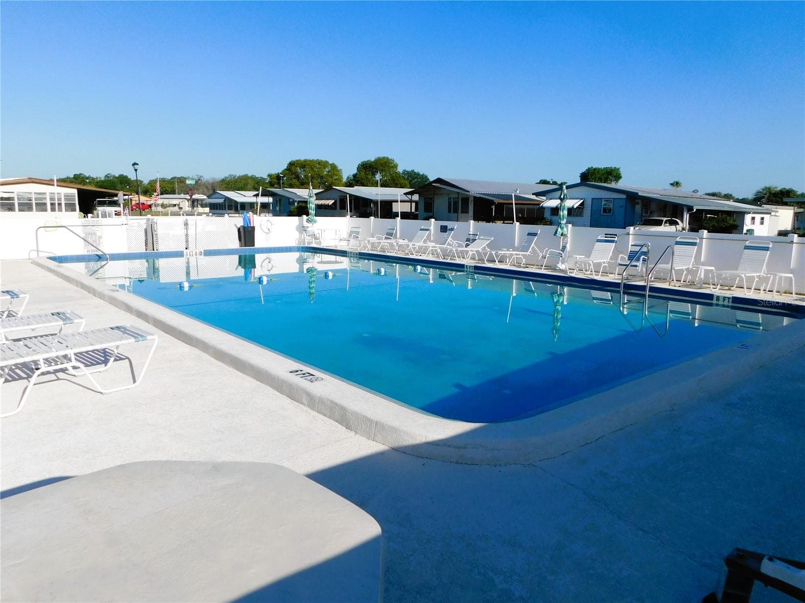 Community heated pool. - 5318 ASTRID DR, ZEPHYRHILLS