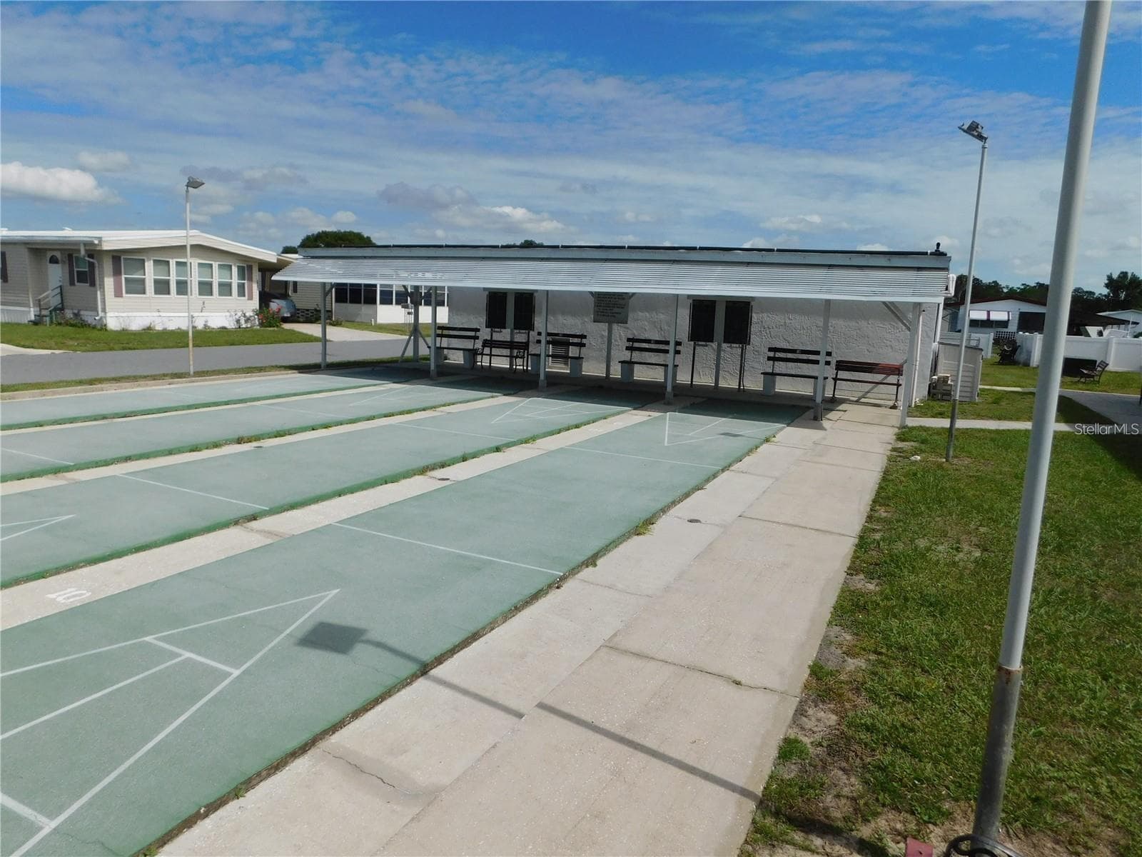 Community shuffle area. - 5318 ASTRID DR, ZEPHYRHILLS
