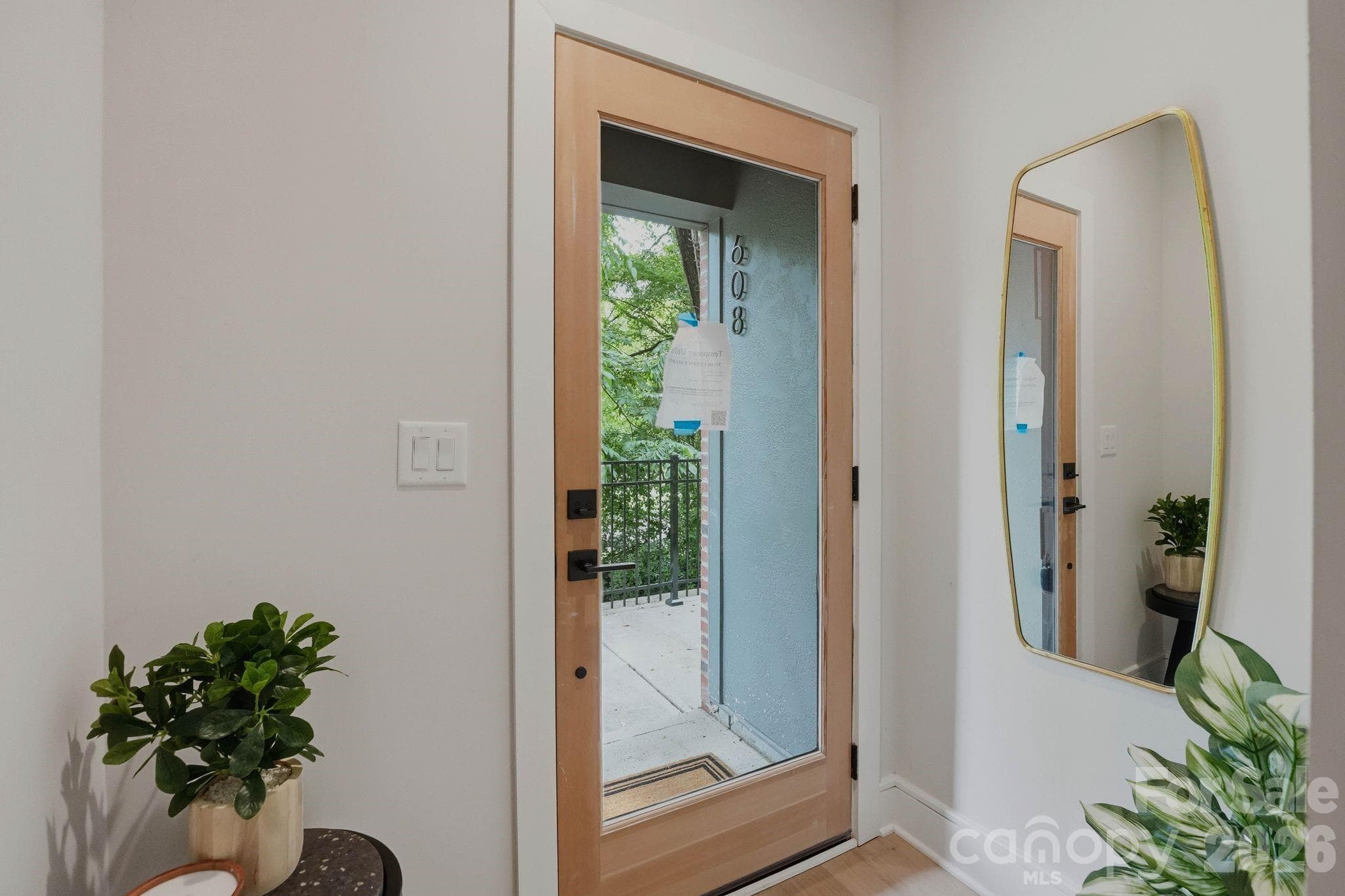 Entry foyer of model home. Staged model as example of this floorpan - 610 E 16th Street, Charlotte
