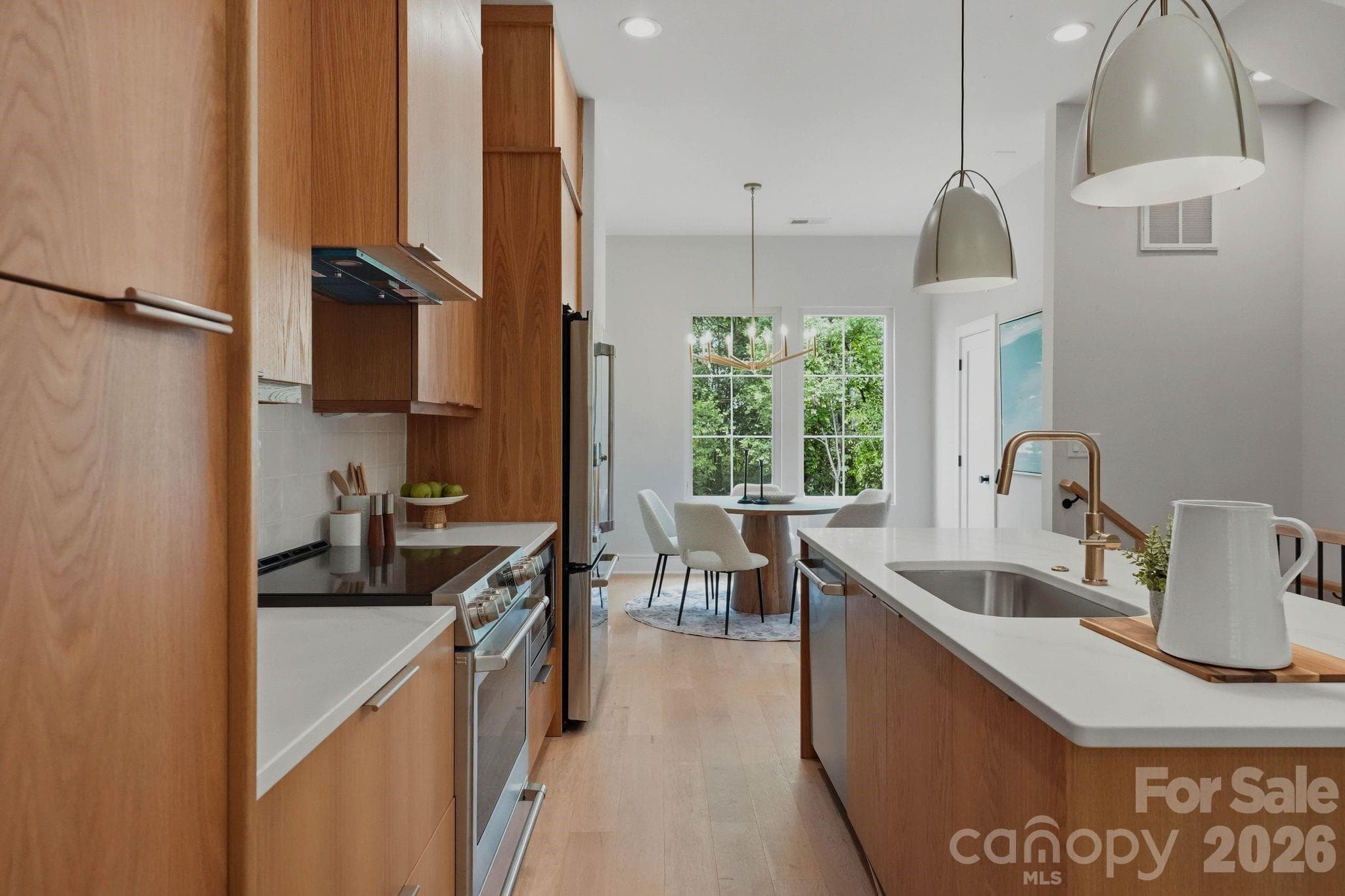 Kitchen of model home.Staged model as example of this floorplan. - 610 E 16th Street, Charlotte