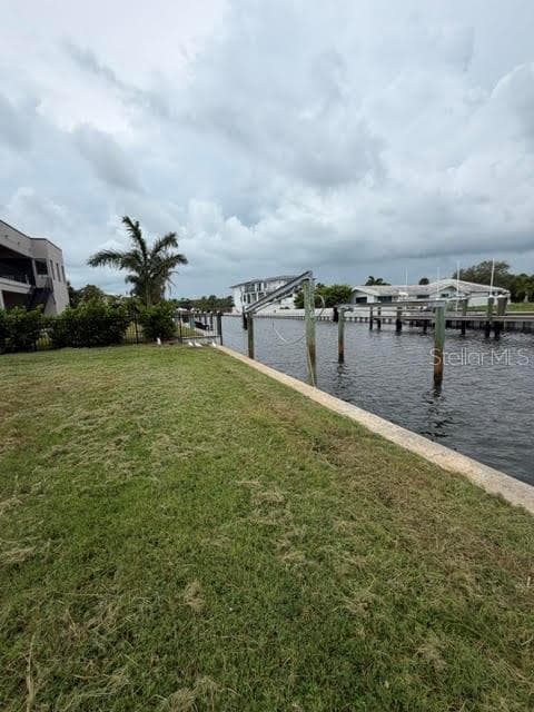 Back of vacant lot showing davits for a new dock on the deep water canal. - 581 ROUNTREE DR, LONGBOAT KEY