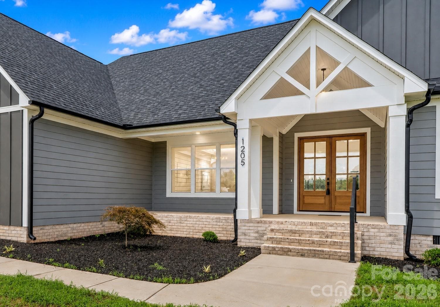 No cookie cutter home here. Front proch is spacious & covered. - 1205 Coppergate Drive, Salisbury