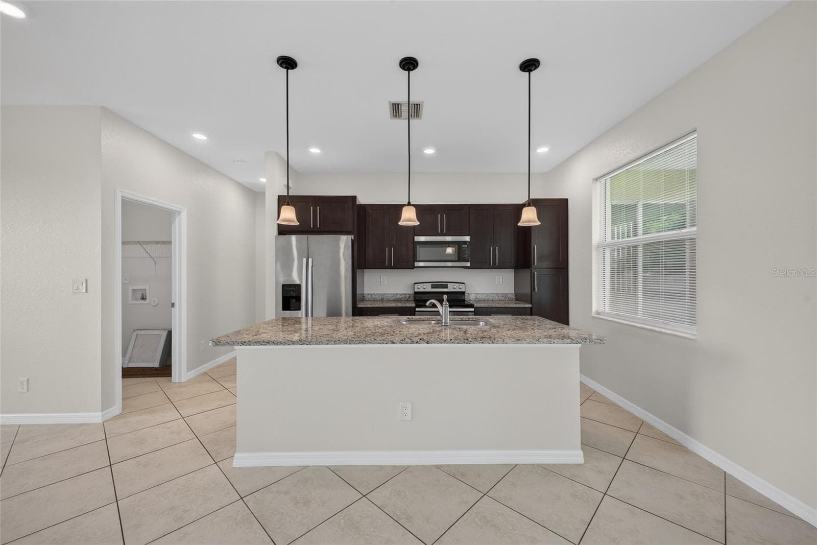 Single Family Residence at 2714 NW 1ST PL, CAPE CORAL, photo 7 of 16