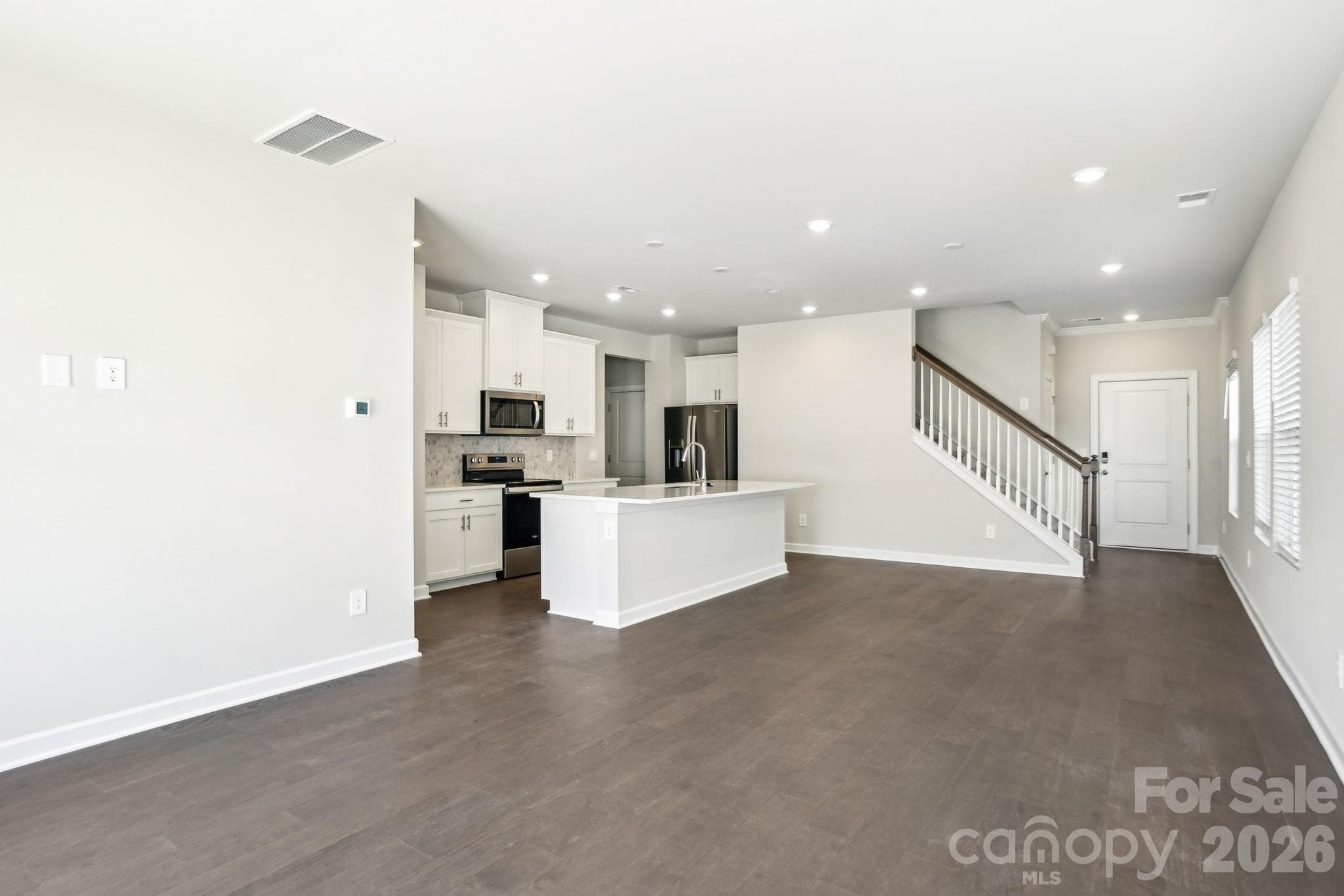 Photo is not of the actual home but is an inspirational photo of builder’s model home and may depict options, furnishings, and/or decorator features that are not included. - 2626 Celestial Drive, Newton