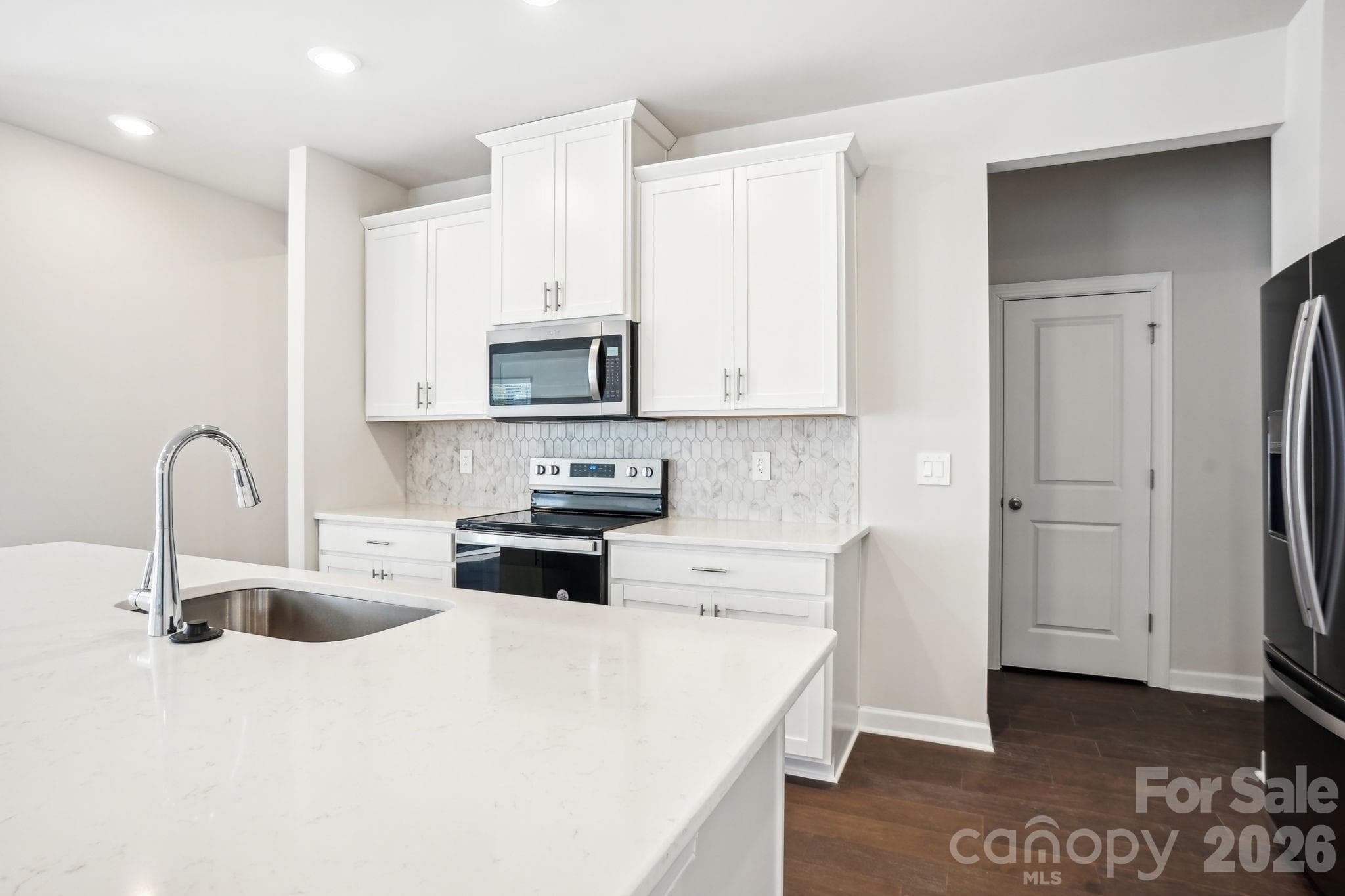 Photo is not of the actual home but is an inspirational photo of builder’s model home and may depict options, furnishings, and/or decorator features that are not included. - 2626 Celestial Drive, Newton