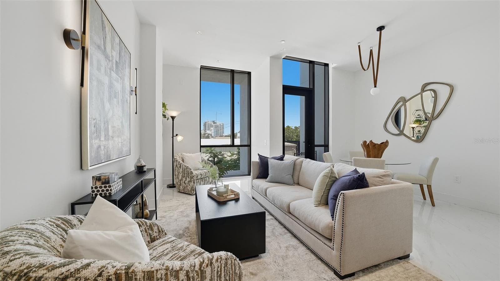 This cozy MOVE IN READY condo on the 2nd floor features two bedrooms, two baths and an open floor plan with tons of light provided by hurricane insulated glass. - 430 KUMQUAT CT #202, SARASOTA