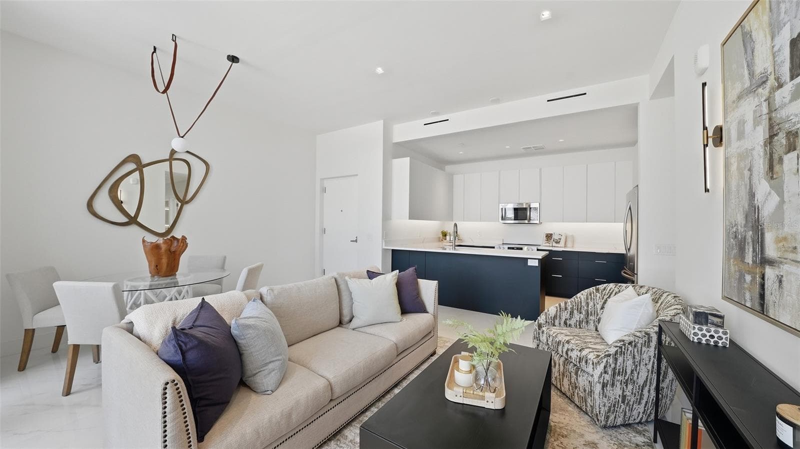 This contemporary condo features energy efficient construction, plenty of light PLUS an outside luxurious pool/spa courtyard. - 430 KUMQUAT CT #202, SARASOTA