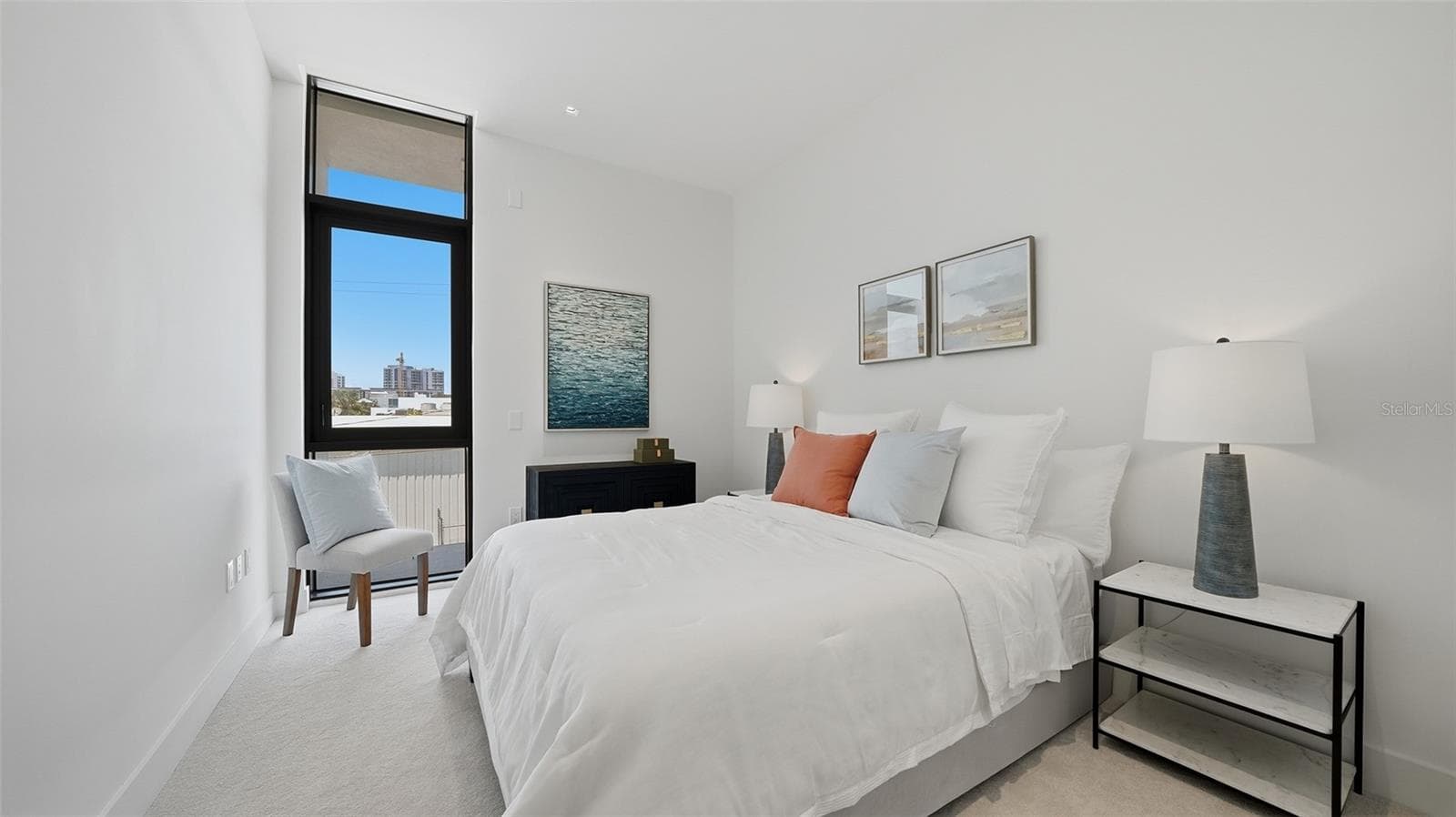 This light, bright guest suite welcomes relaxation with full bath immediately opposite. - 430 KUMQUAT CT #202, SARASOTA