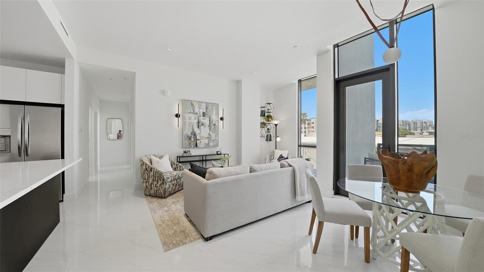 This new Villa Ballada condo features hurricane rate insulated glass and a luxurious pool/spa courtyard. - 430 KUMQUAT CT #202, SARASOTA