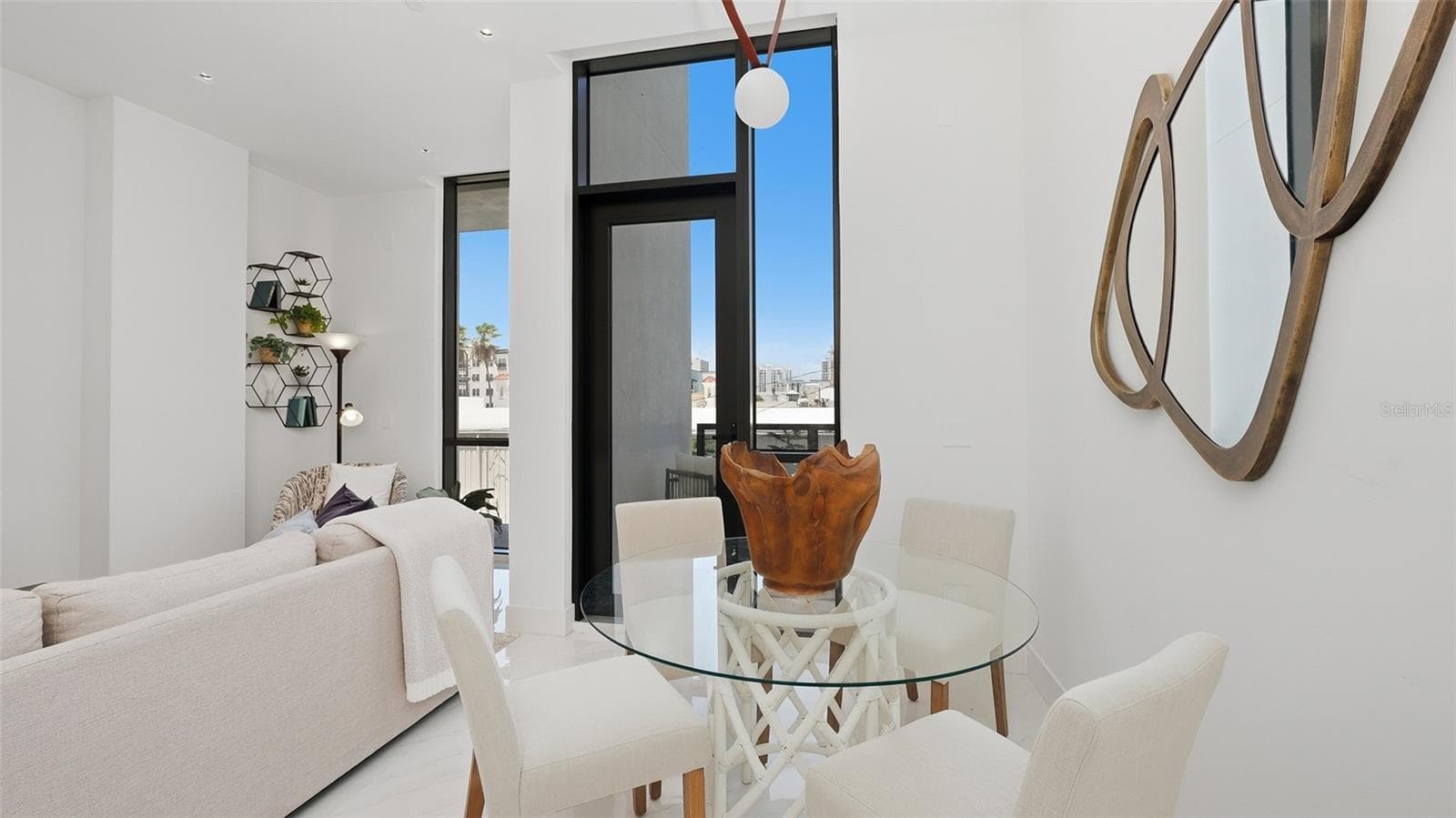 This condo features European designer finishes, and secure garage, lobby and building elevator and two west facing patios. - 430 KUMQUAT CT #202, SARASOTA