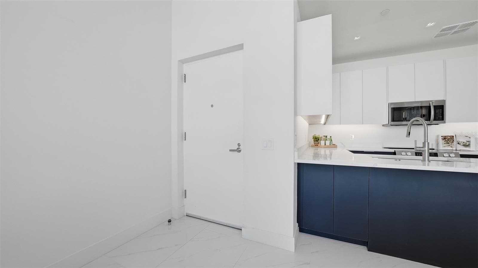 You will love living in this two bedroom condo featuring sophisticated European cabinetry, all stainless kitchen appliances and insulated glass. - 430 KUMQUAT CT #202, SARASOTA