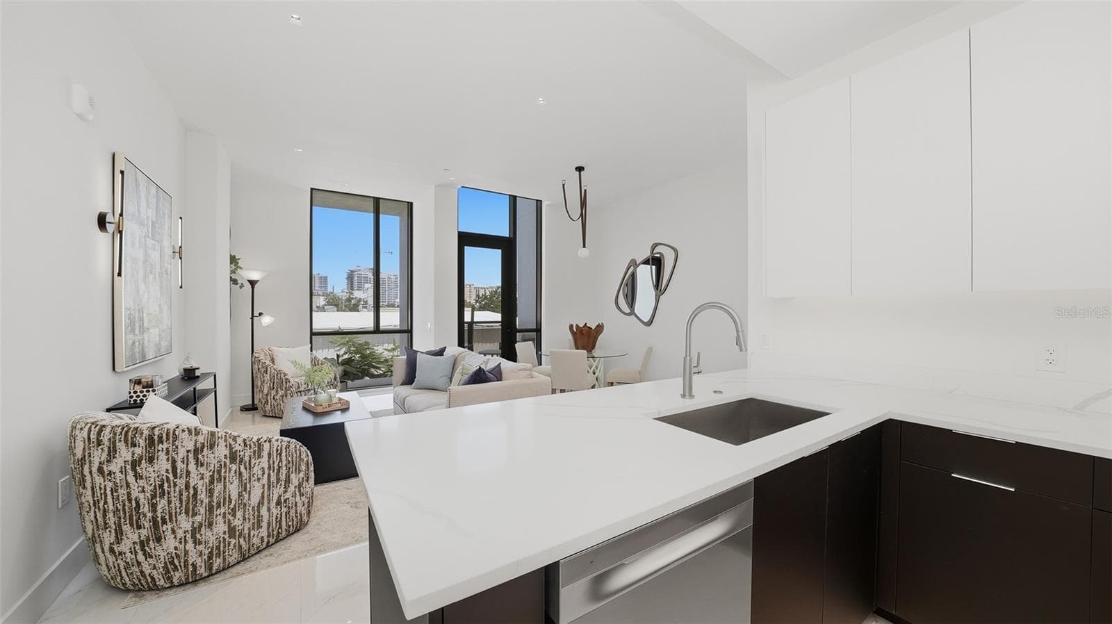 You will love living in this two bedroom condo featuring sophisticated European cabinetry, all stainless kitchen appliances and insulated glass. - 430 KUMQUAT CT #202, SARASOTA