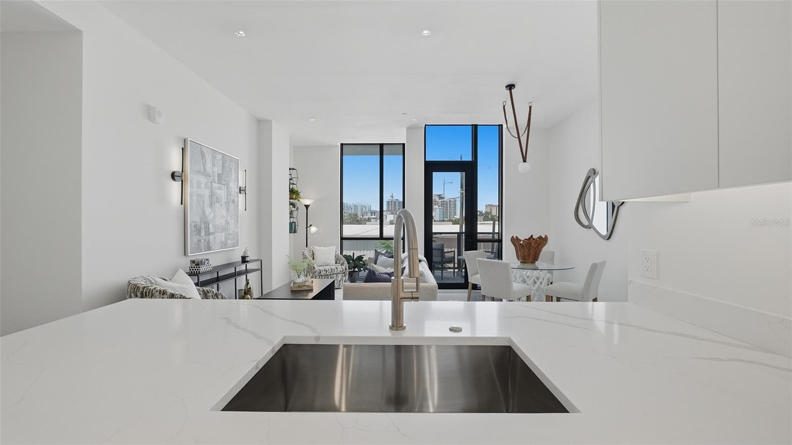 Welcome home! Contemporary architecture and energy efficient construction defines this light,bright two bedroom condo. - 430 KUMQUAT CT #202, SARASOTA