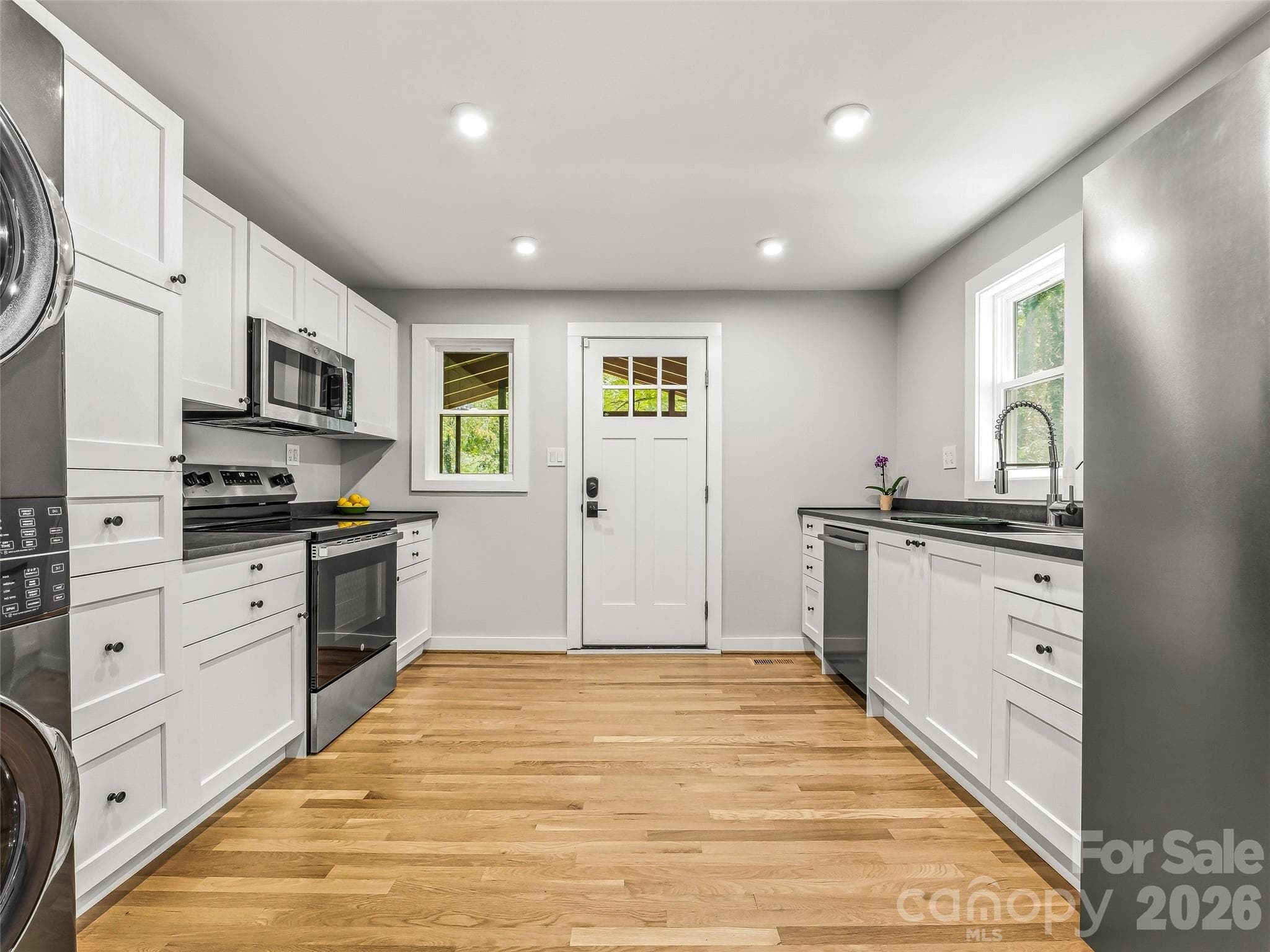 Well-appointed custom kitchen. - 468 Governors View Road, Asheville