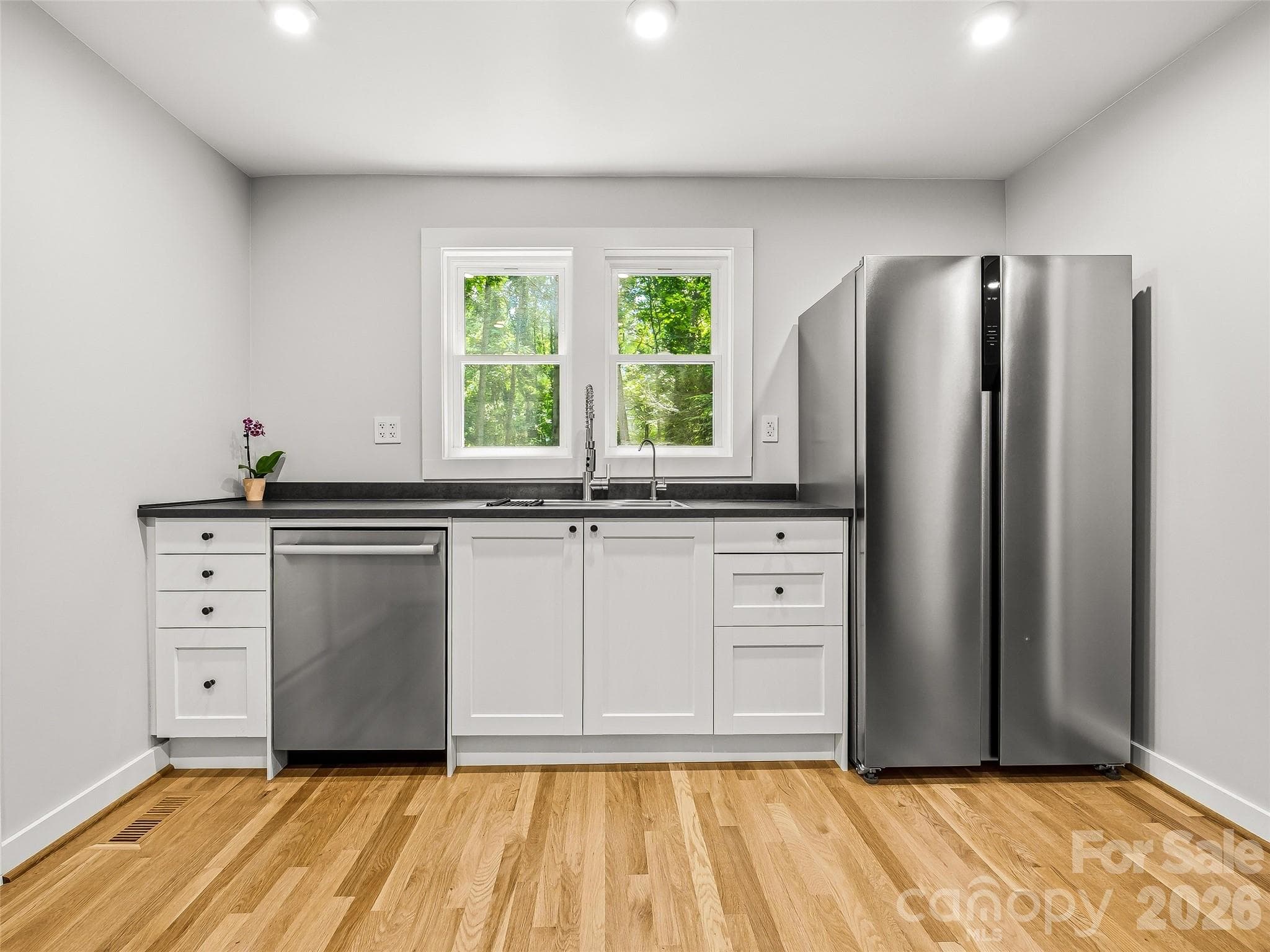 Well-appointed custom kitchen. - 468 Governors View Road, Asheville