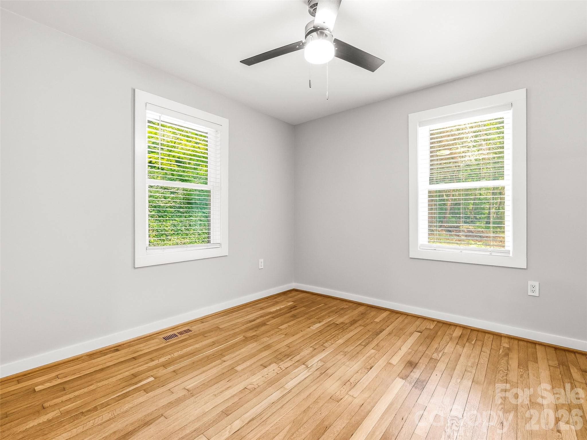 Second bedroom with abundant light through the beautiful windows. - 468 Governors View Road, Asheville