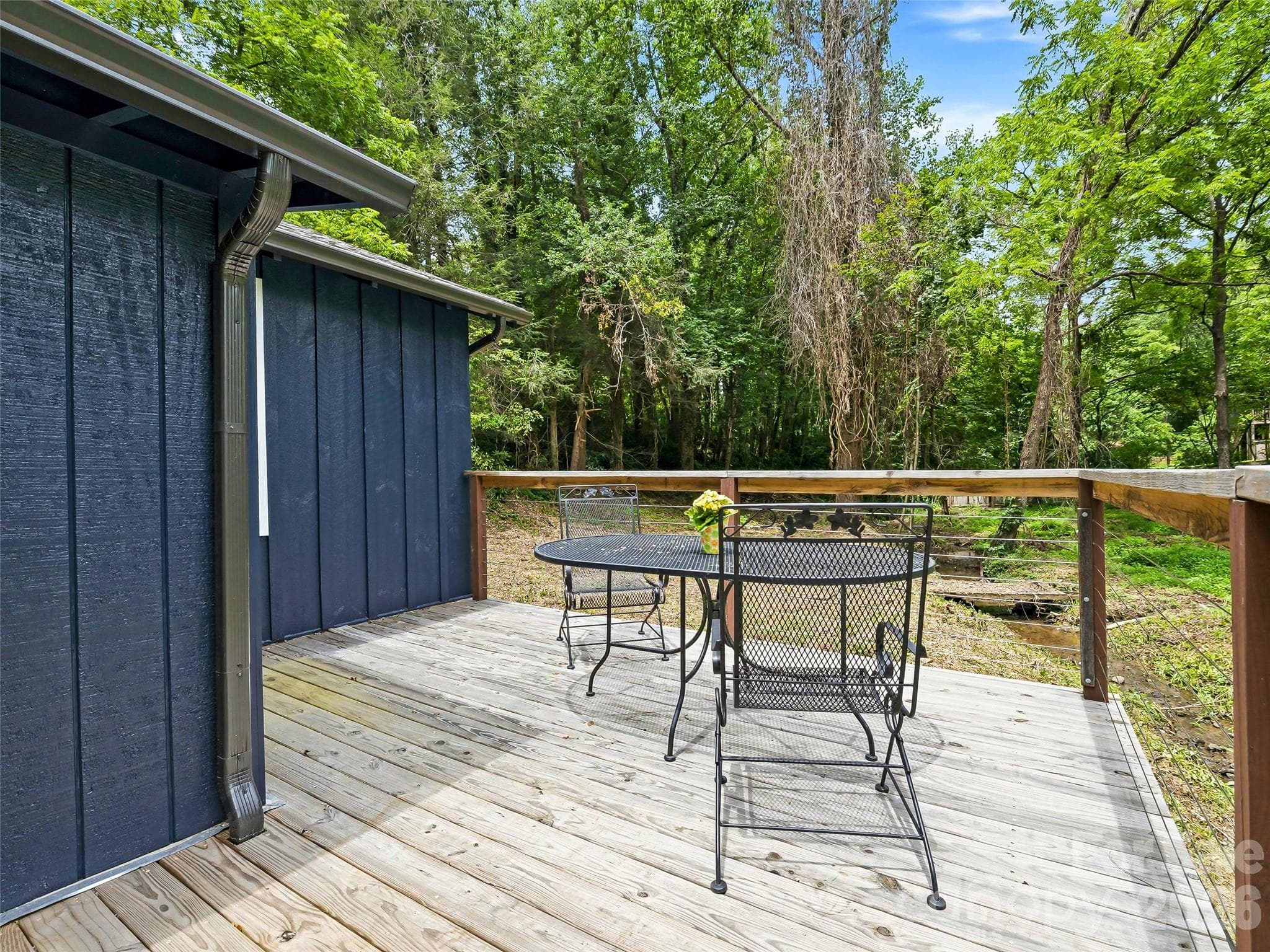 Quaint back deck by the slow-moving creek. - 468 Governors View Road, Asheville