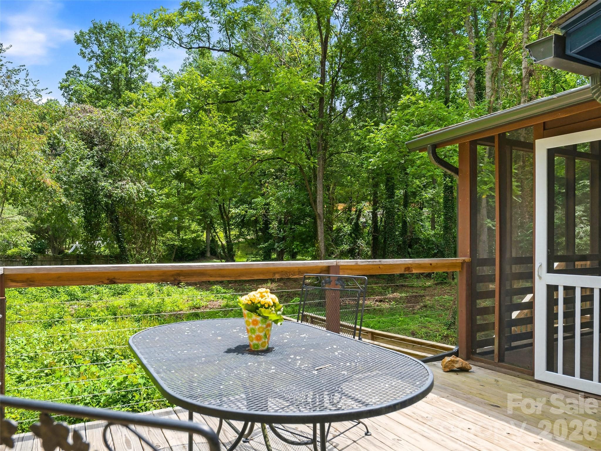 Back deck seating area. - 468 Governors View Road, Asheville