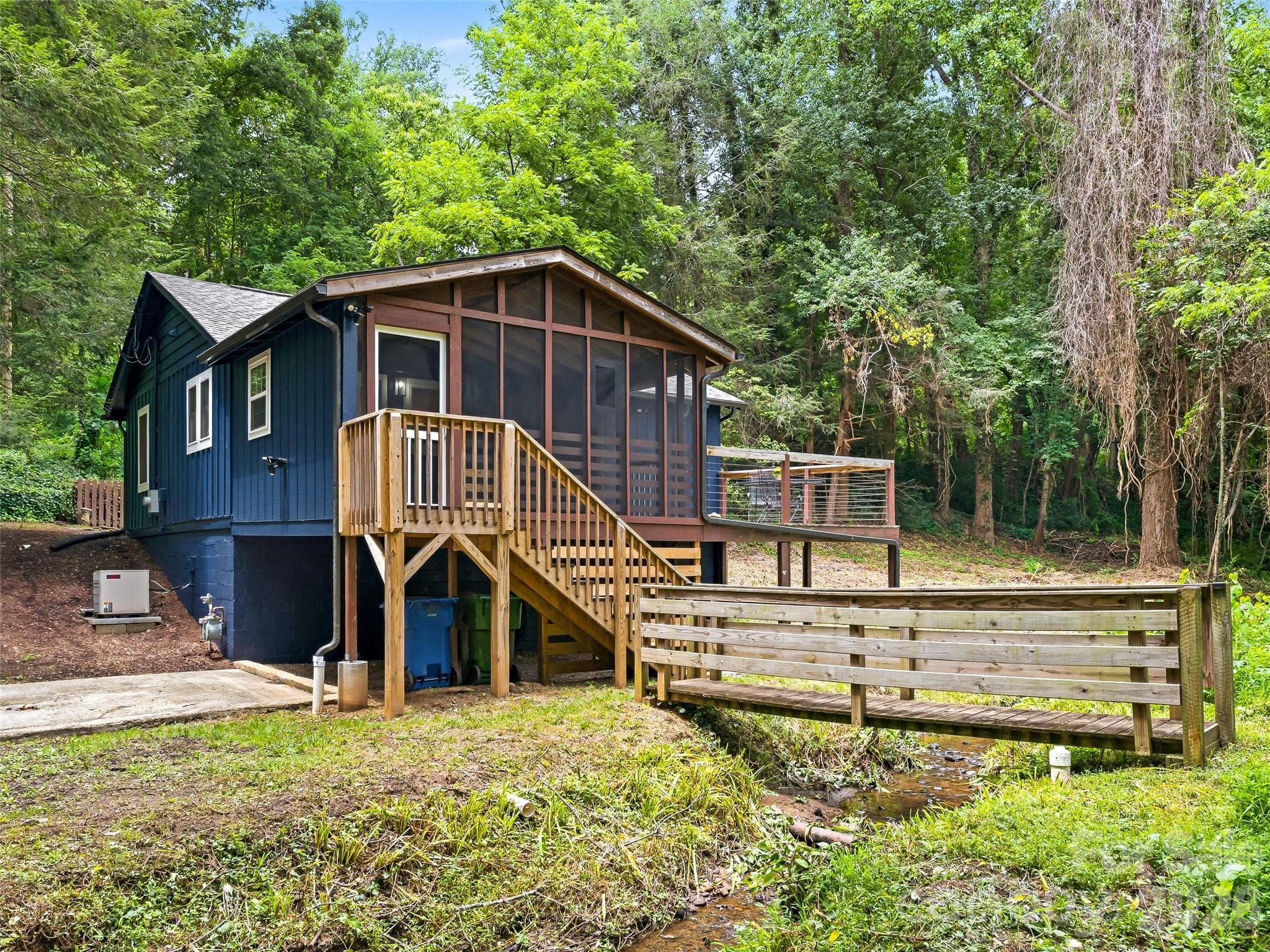 View of home and walk bridge used for accessing backyard space. - 468 Governors View Road, Asheville