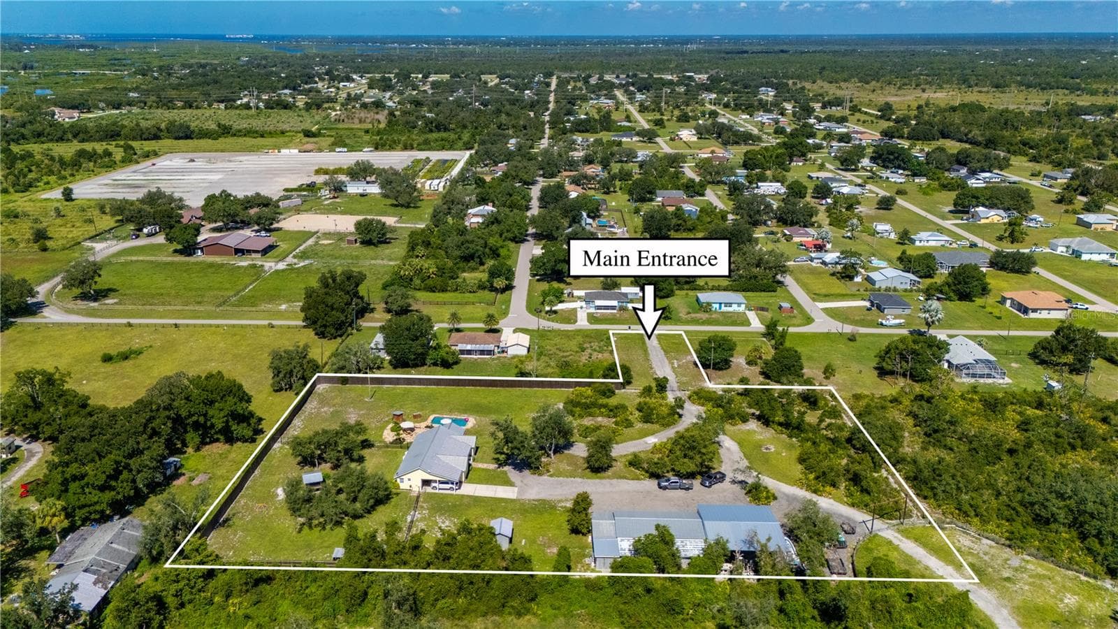 MAIN ENTRANCE OFF OF MANGROVE ROAD - 30941 TURKEY OAK RD, PUNTA GORDA