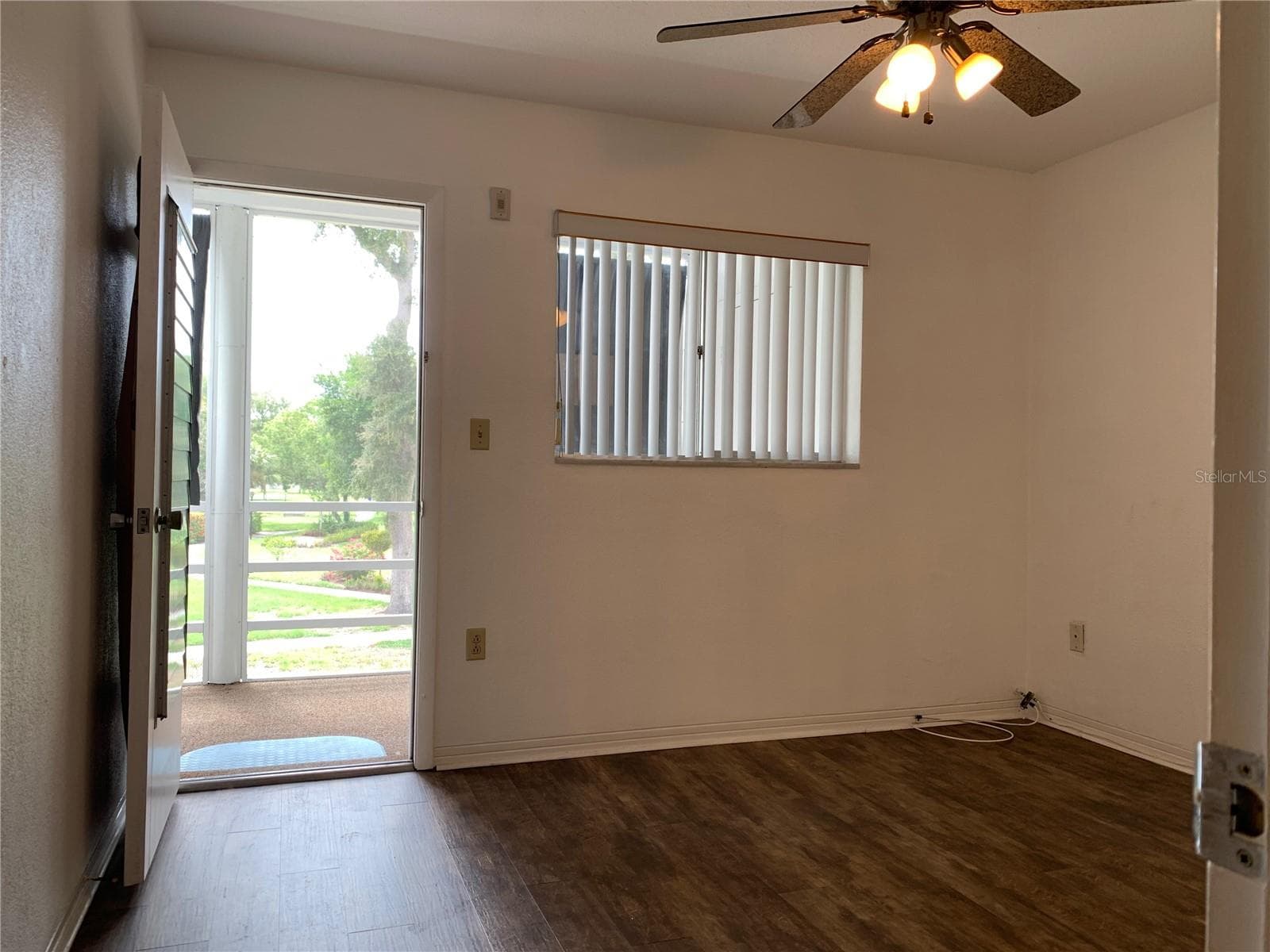 Door to back screened porch from Bedroom 2 - 8126 112TH ST #203, SEMINOLE