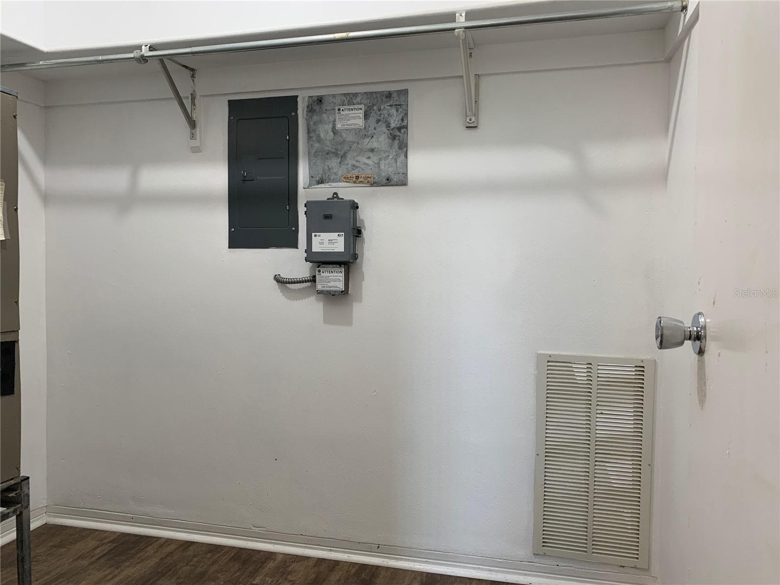 Walk in closet in primary bedroom houses the panel and air handler - 8126 112TH ST #203, SEMINOLE