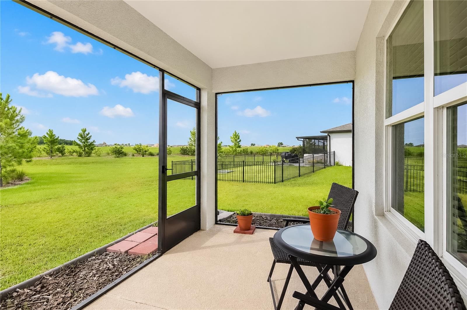 Panoramic screened patio - 5517 SW 85TH AVENUE RD, OCALA