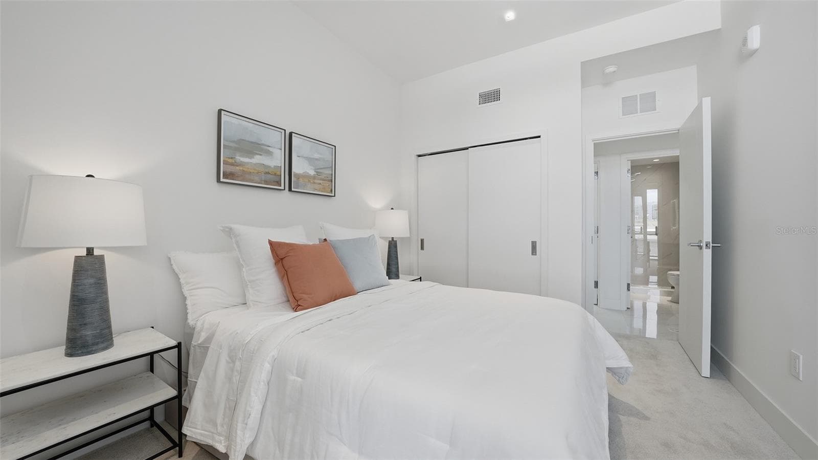 This light, bright guest suite welcomes relaxation with full bath immediately opposite. - 430 KUMQUAT CT #202, SARASOTA