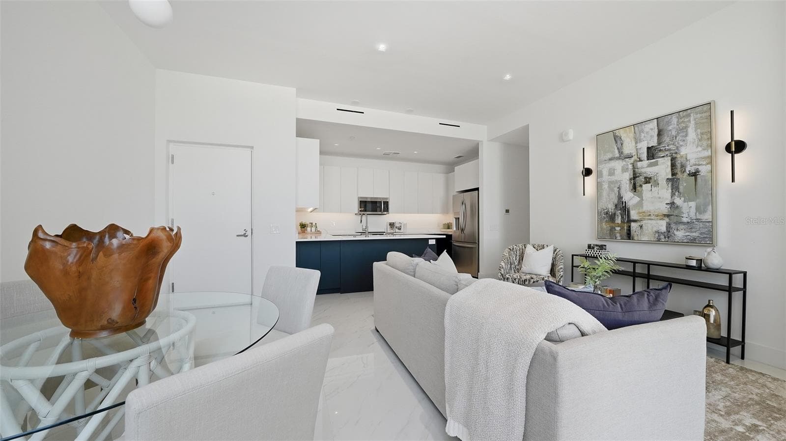 This condo features European designer finishes, and secure garage, lobby and building elevator and two west facing patios. - 430 KUMQUAT CT #202, SARASOTA