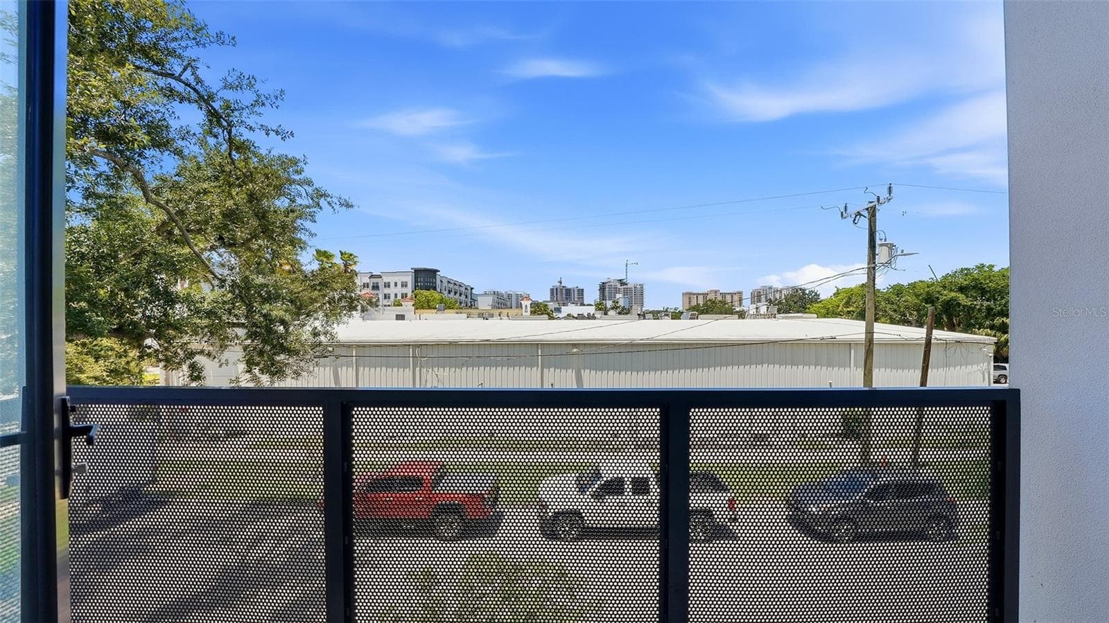 This primary suite is spacious and also light, bright which features a private west facing patio. - 430 KUMQUAT CT #202, SARASOTA