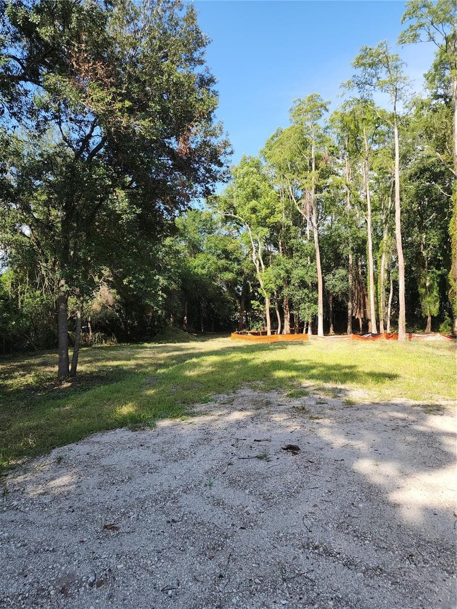 Prepared building site featuring a generous 0.4-acre upland area, providing ample space to build your dream home and enjoy the surrounding natural beauty. The elevated homesite offers a solid foundation for construction while maximizing privacy and outdoor living opportunities. - 7709 WINDWARD WAY, ODESSA