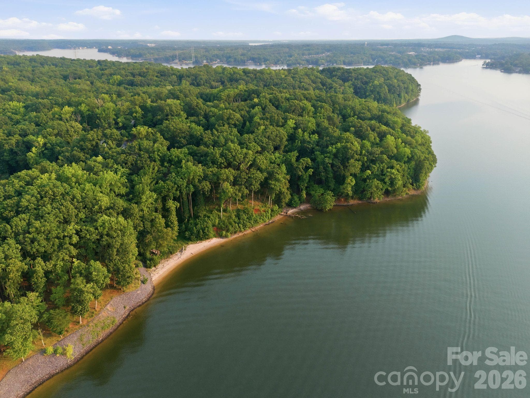 340 feet of shoreline that has been previously approved for a private dock. - 13702 Sage Thrasher Lane, Charlotte