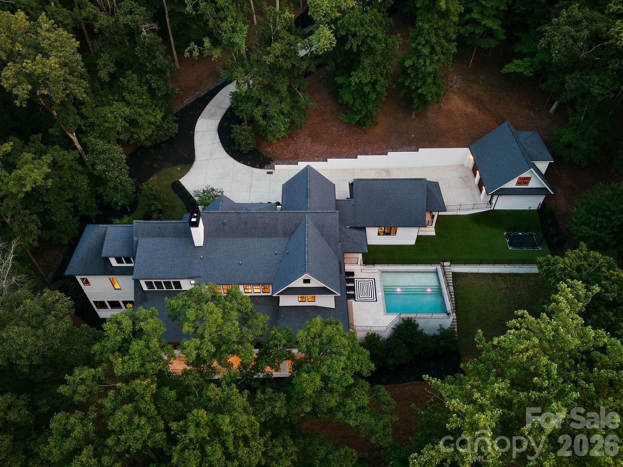 Estate features multiple attached bays, as well as a separate 2 car detached garage with unfinished space that is plumbed and prewired. - 13702 Sage Thrasher Lane, Charlotte