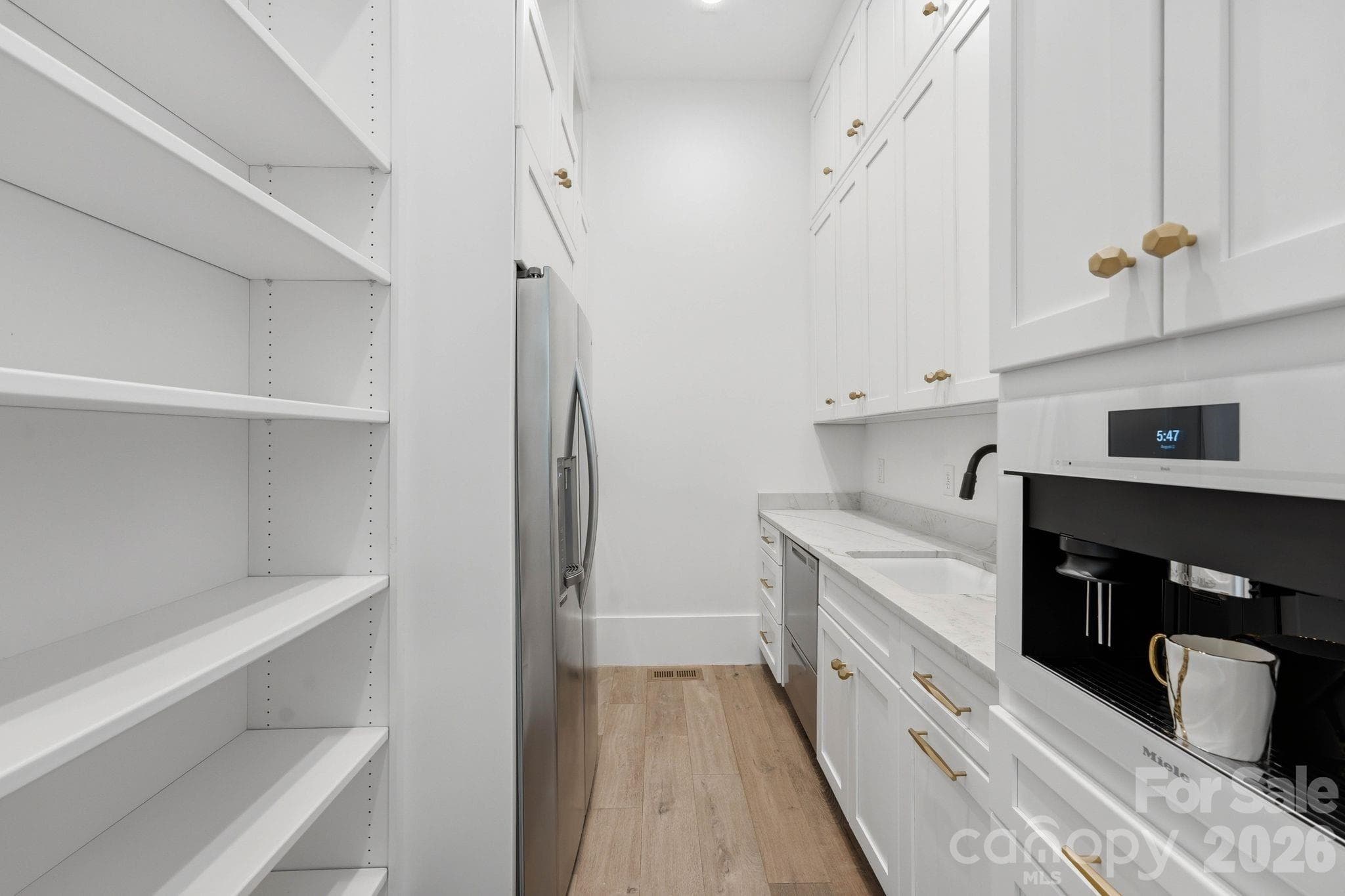 Scullery with a built in Miele coffee maker. - 13702 Sage Thrasher Lane, Charlotte