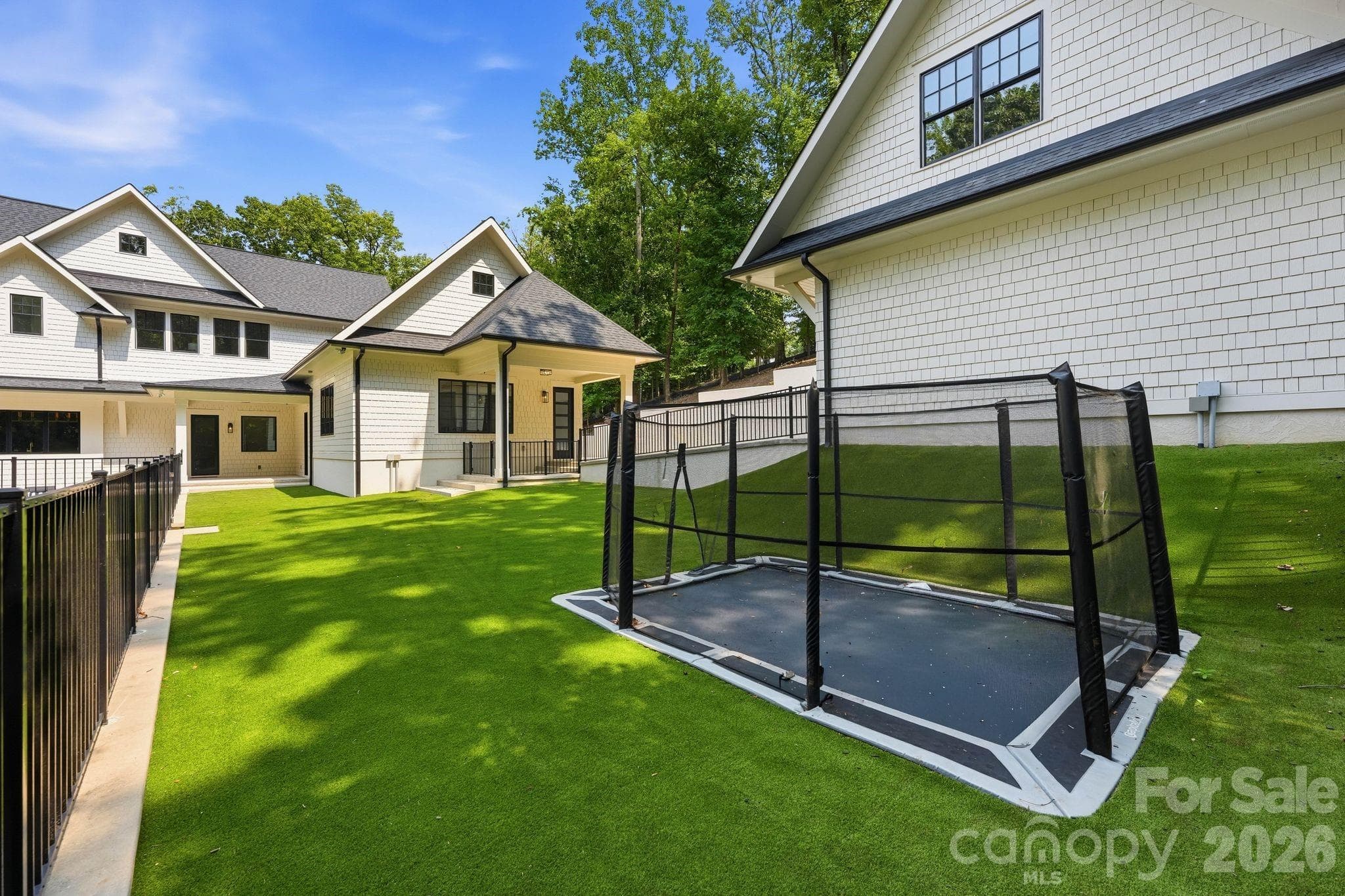 In ground trampoline and lots of green space to run around - 13702 Sage Thrasher Lane, Charlotte
