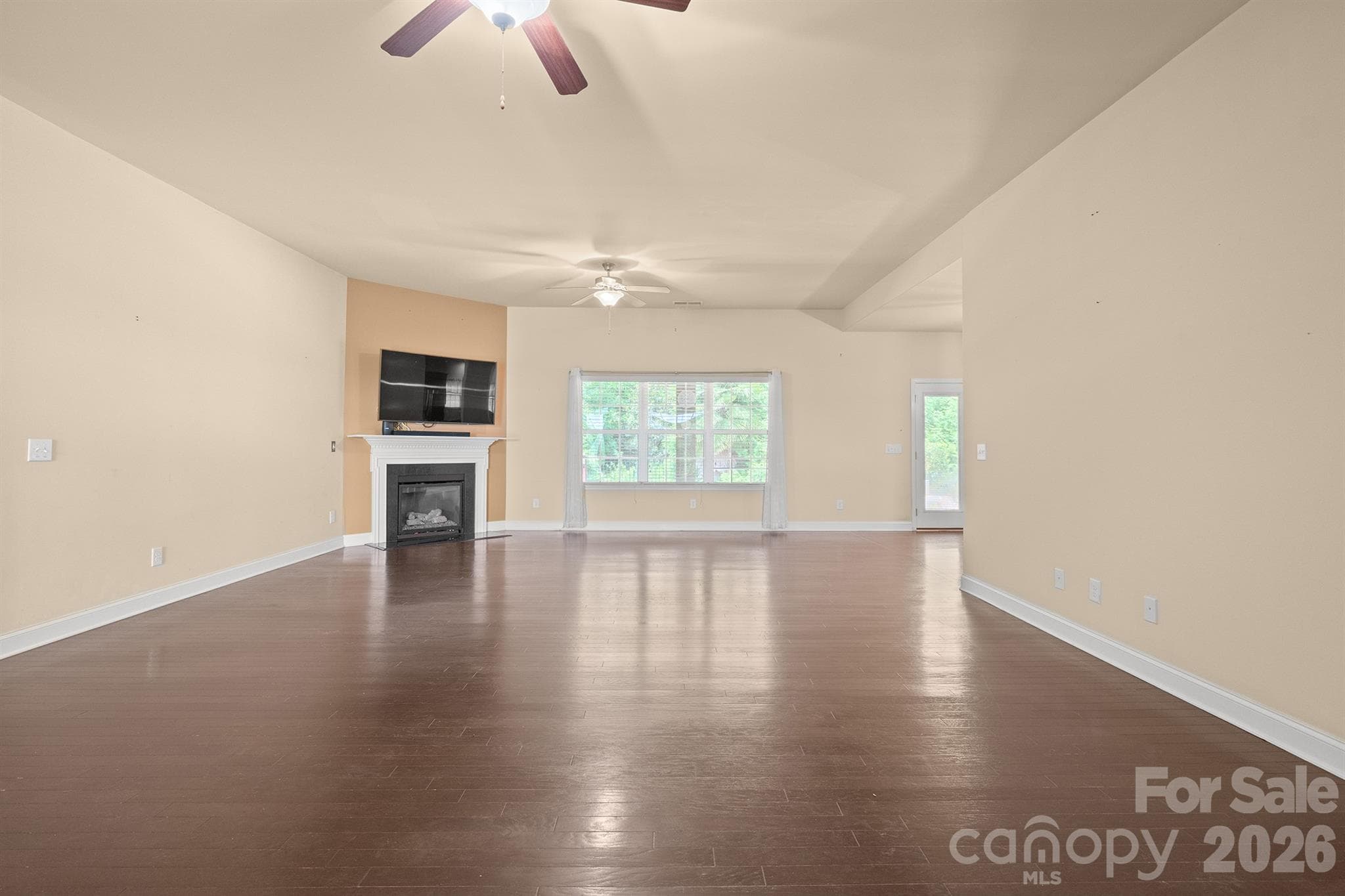 living room with fire place - 589 Shepherd Road, Troutman