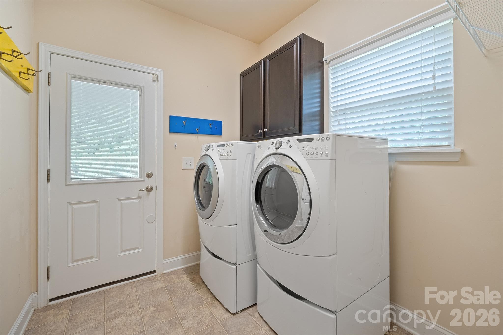 laundry/mud room off back patio - 589 Shepherd Road, Troutman
