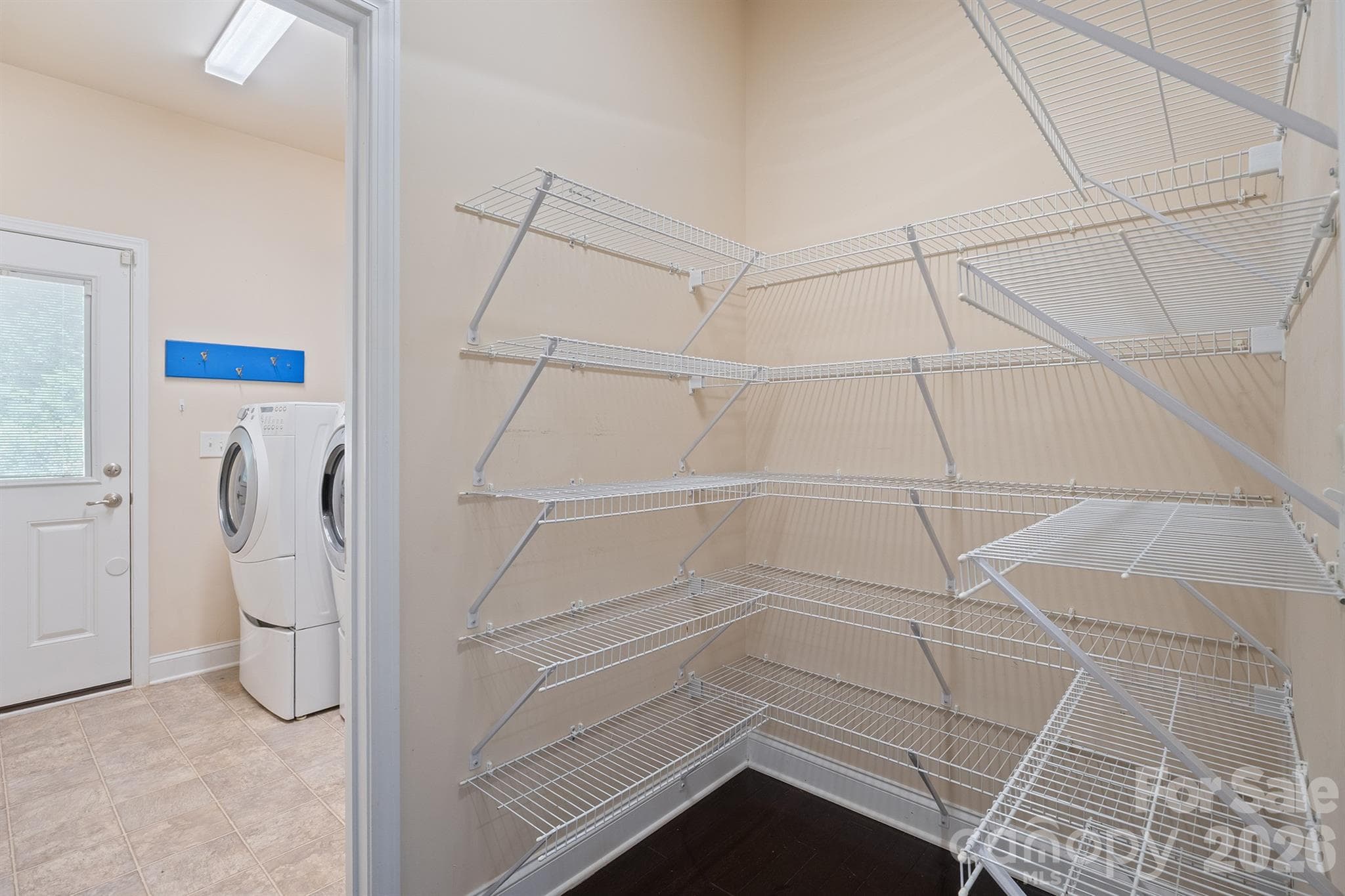 walk-in pantry off laundry and kitchen - 589 Shepherd Road, Troutman