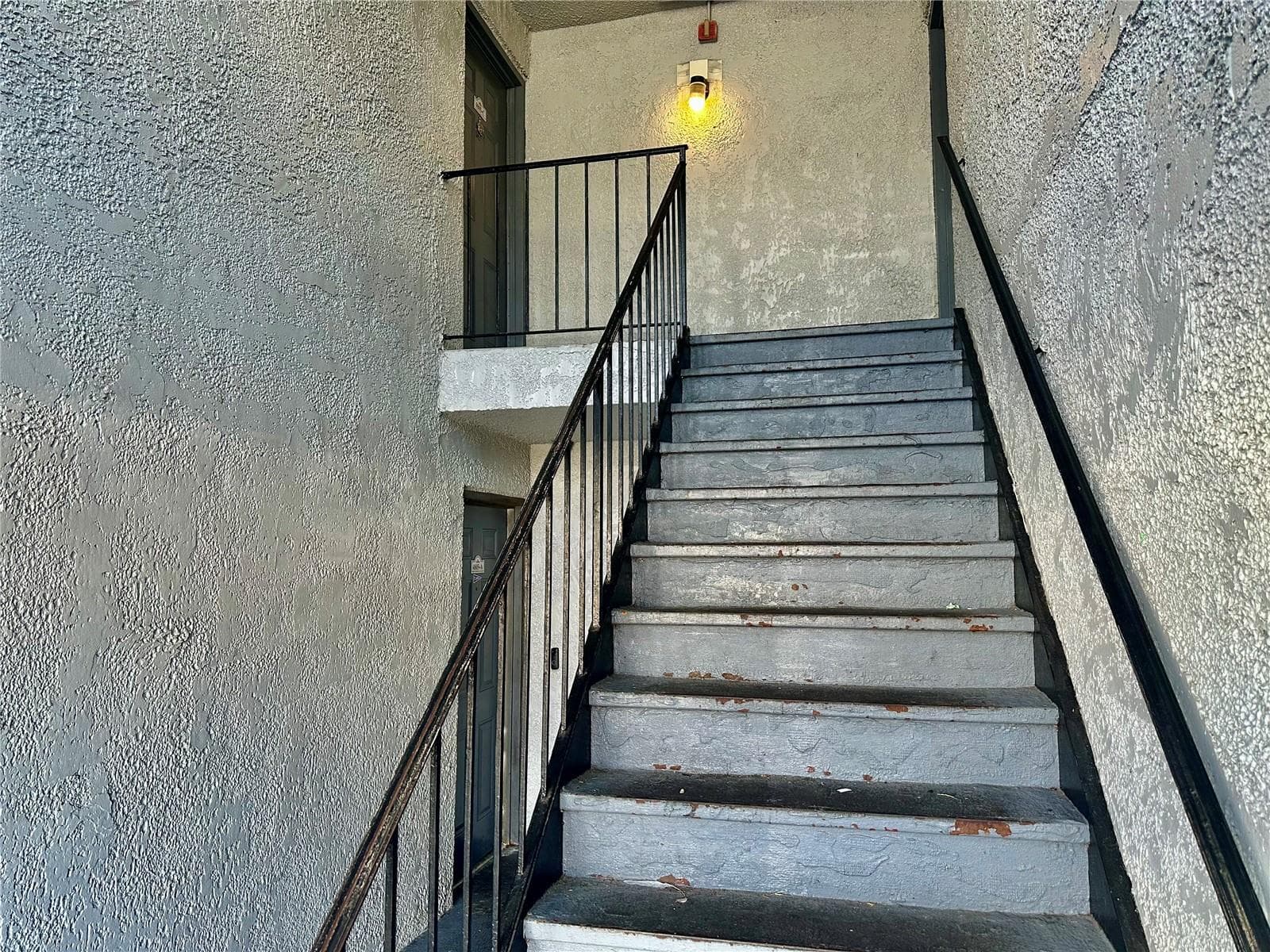 Going up stairs - 4805 S TEXAS AVE #4805C, ORLANDO